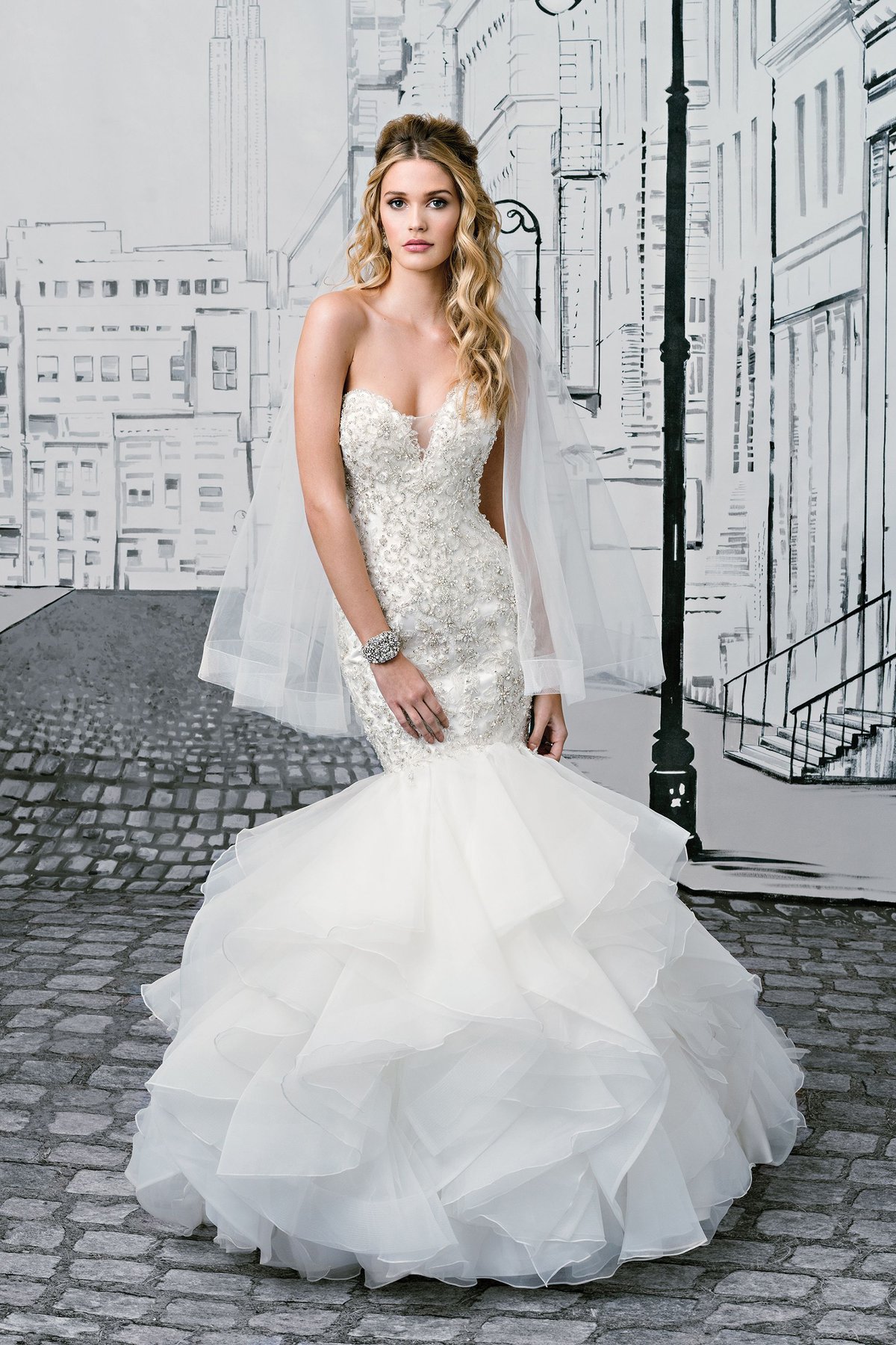 8901: Beaded Metallic Lace Mermaid Gown with Tiered Ruffled Skirt
