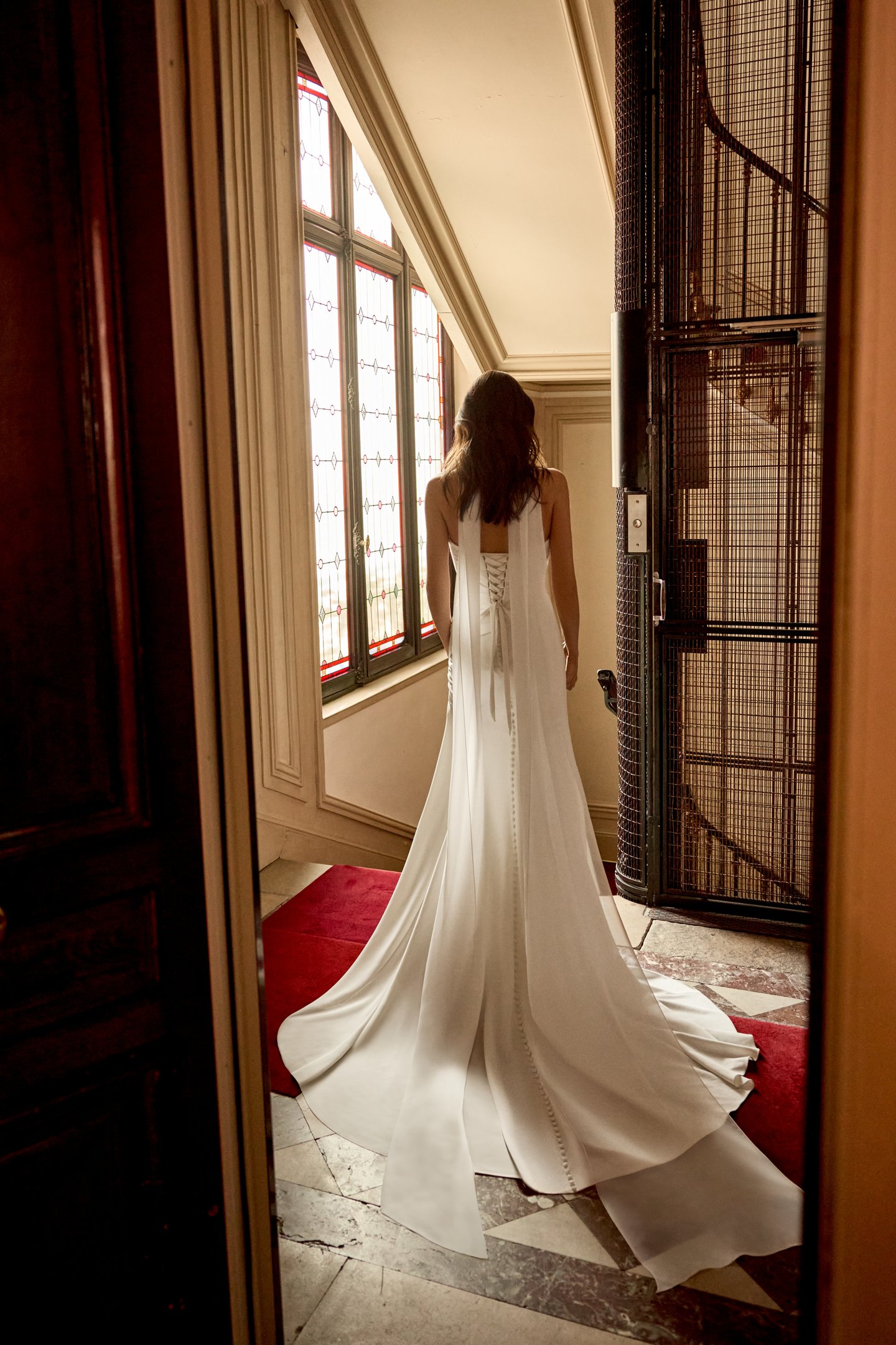 Adore by Justin Alexander Style 11429 Fabienne Stretch Crepe Fit and Flare with Ruched Bodice and Asymmetrical Waist
