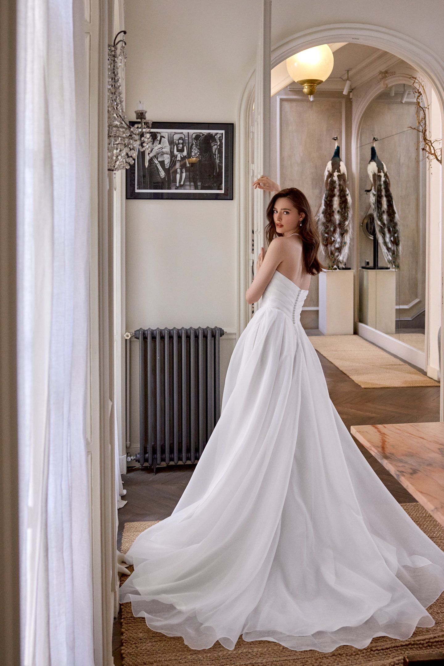 Adore by Justin Alexander Style 11431 Chloe Organza A-Line Gown with Asymmetrical Draped Bodice and Basque WaistAdore by Justin Alexander Style 11431 Chloe Organza A-Line Gown with Asymmetrical Draped Bodice and Basque Waist
