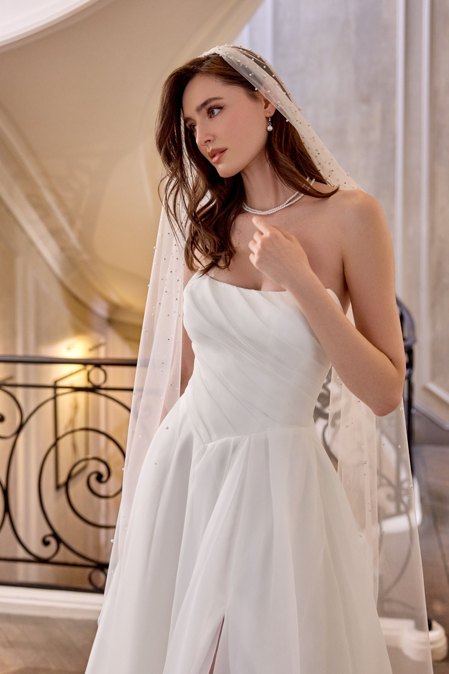 Adore by Justin Alexander Style 11431 Chloe Organza A-Line Gown with Asymmetrical Draped Bodice and Basque Waist