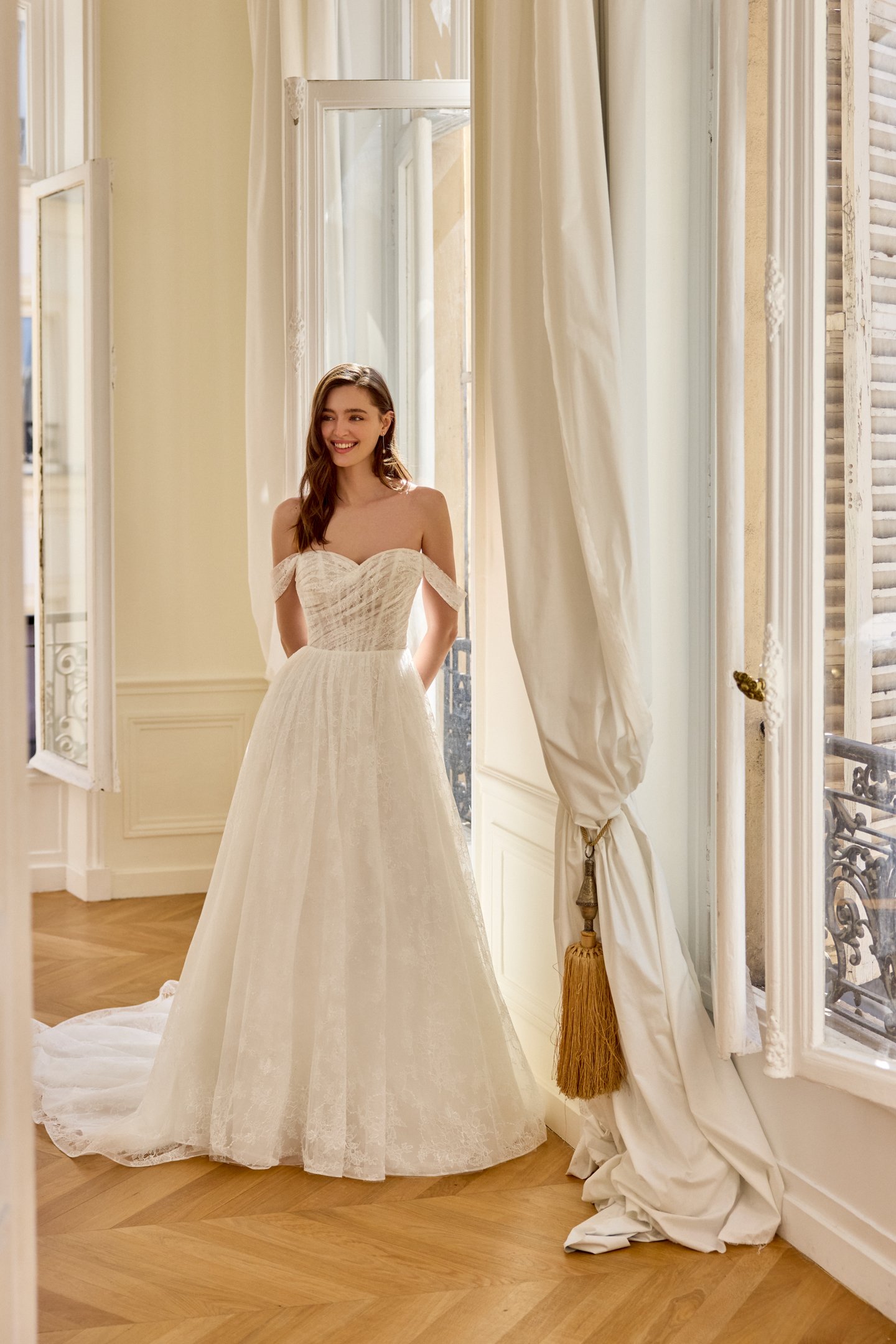 Adore by Justin Alexander Style 11440 Anabelle Allover Chantilly Lace A-Line Gown with Asymmetrical Draped Bodice