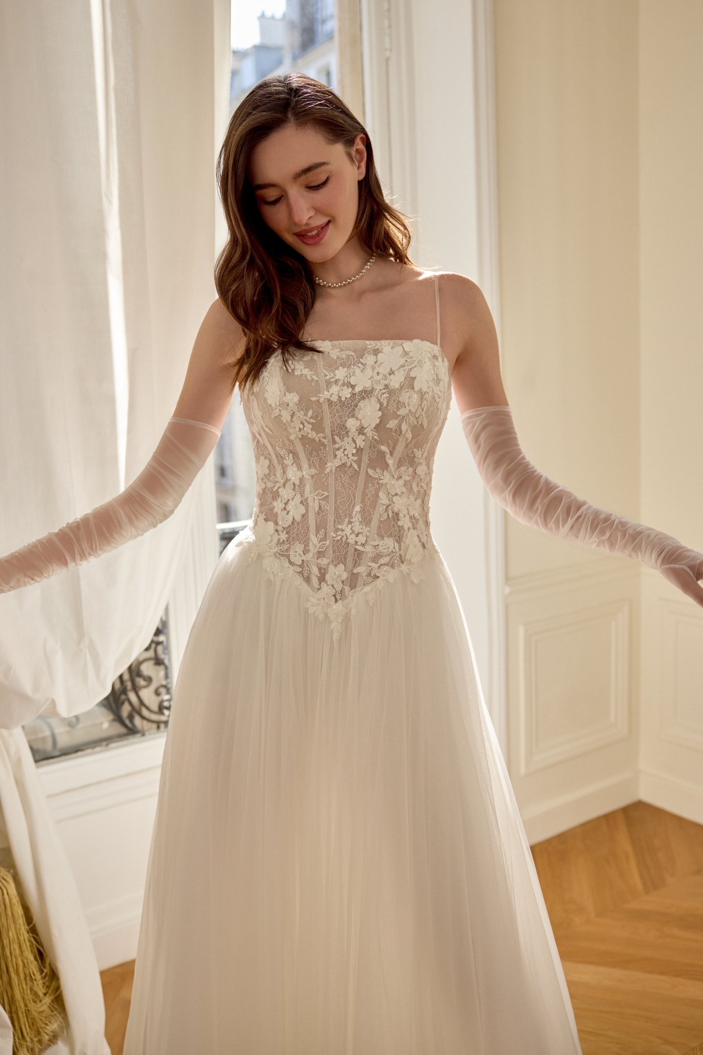 Adore by Justin Alexander Style 11447 Delphine English Net A-Line with Arched Neckline and Chantilly Lace Bodice