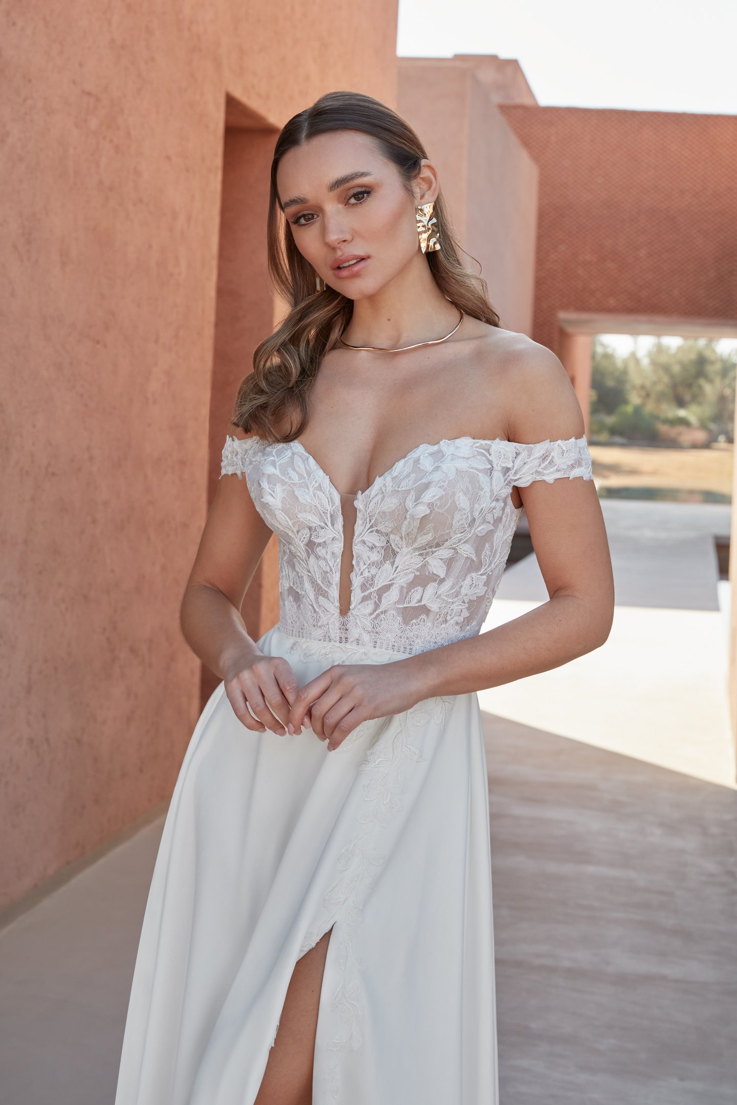 Adore by Justin Alexander Style 11317 Imara Plunging Off The Shoulder Neckline A-Line with Chantilly Lace