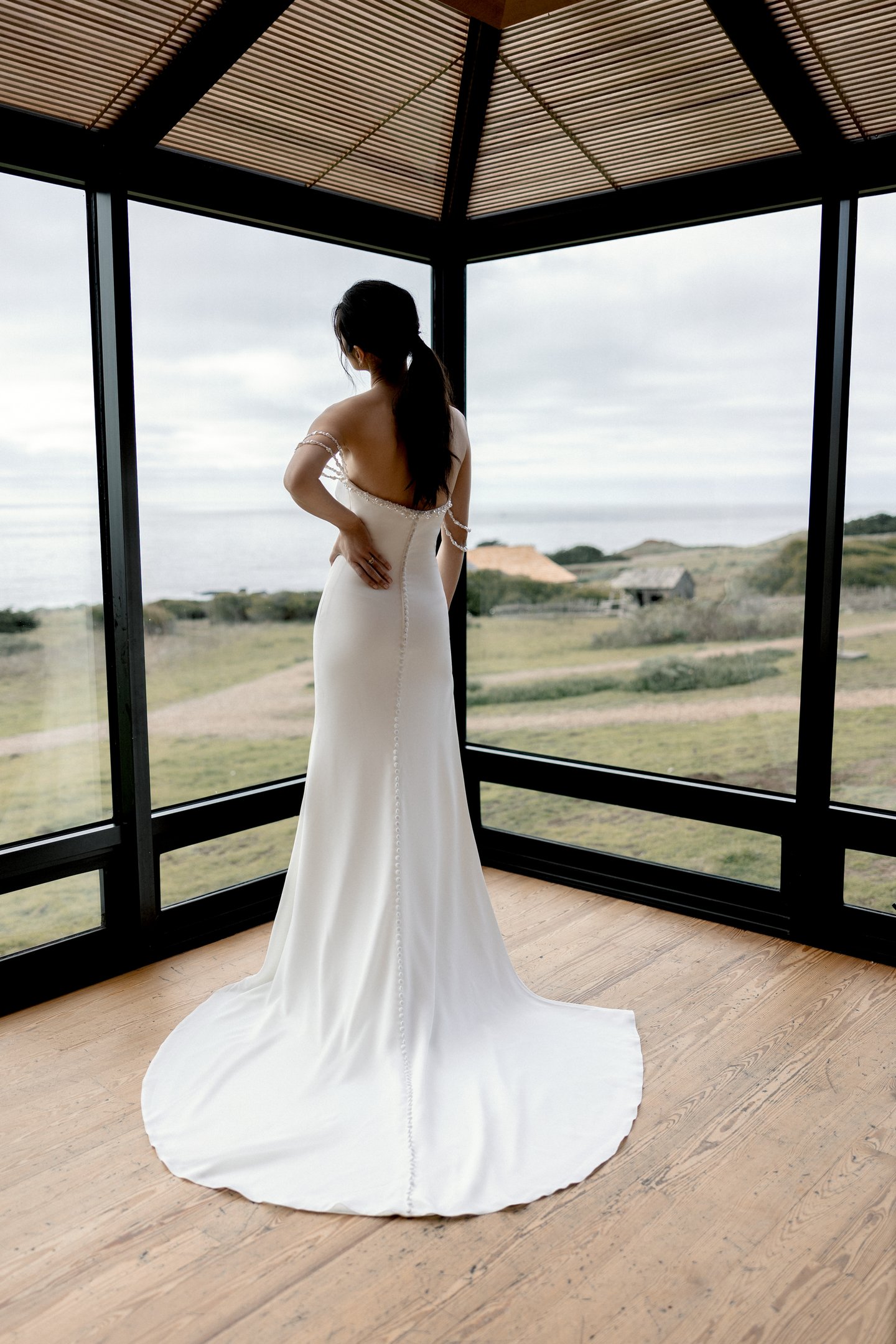 Adore by Justin Alexander Style 11405 Nixie Stretch Crepe Fit and Flare Gown with Freshwater Pearl-Trimmed Neckline and a Slit