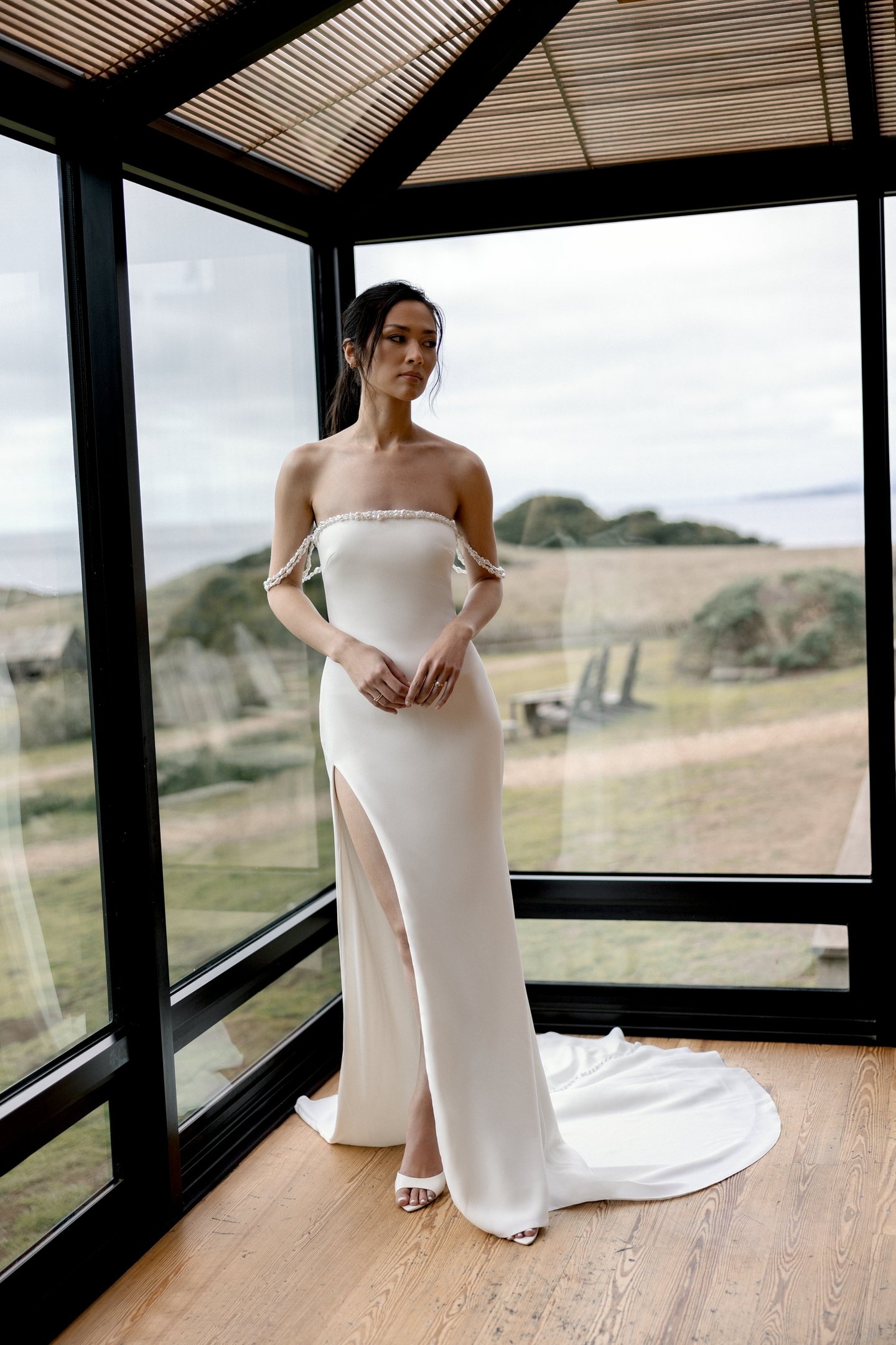 Adore by Justin Alexander Style 11405 Nixie Stretch Crepe Fit and Flare Gown with Freshwater Pearl-Trimmed Neckline and a Slit