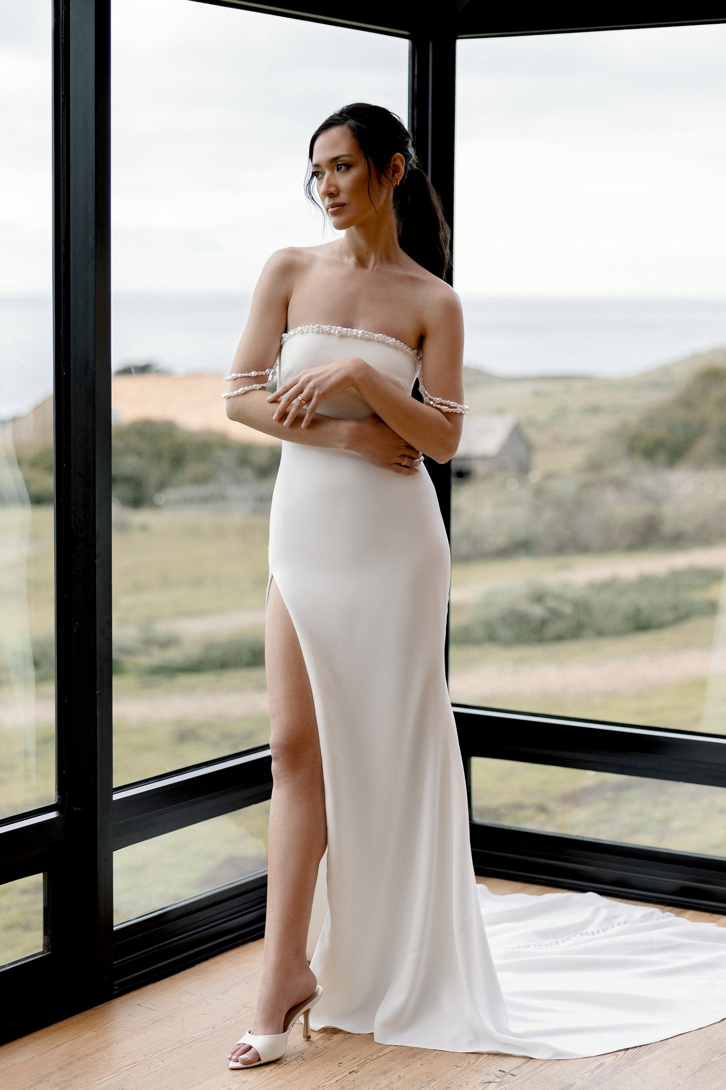 Adore by Justin Alexander Style 11405 Nixie Stretch Crepe Fit and Flare Gown with Freshwater Pearl-Trimmed Neckline and a Slit