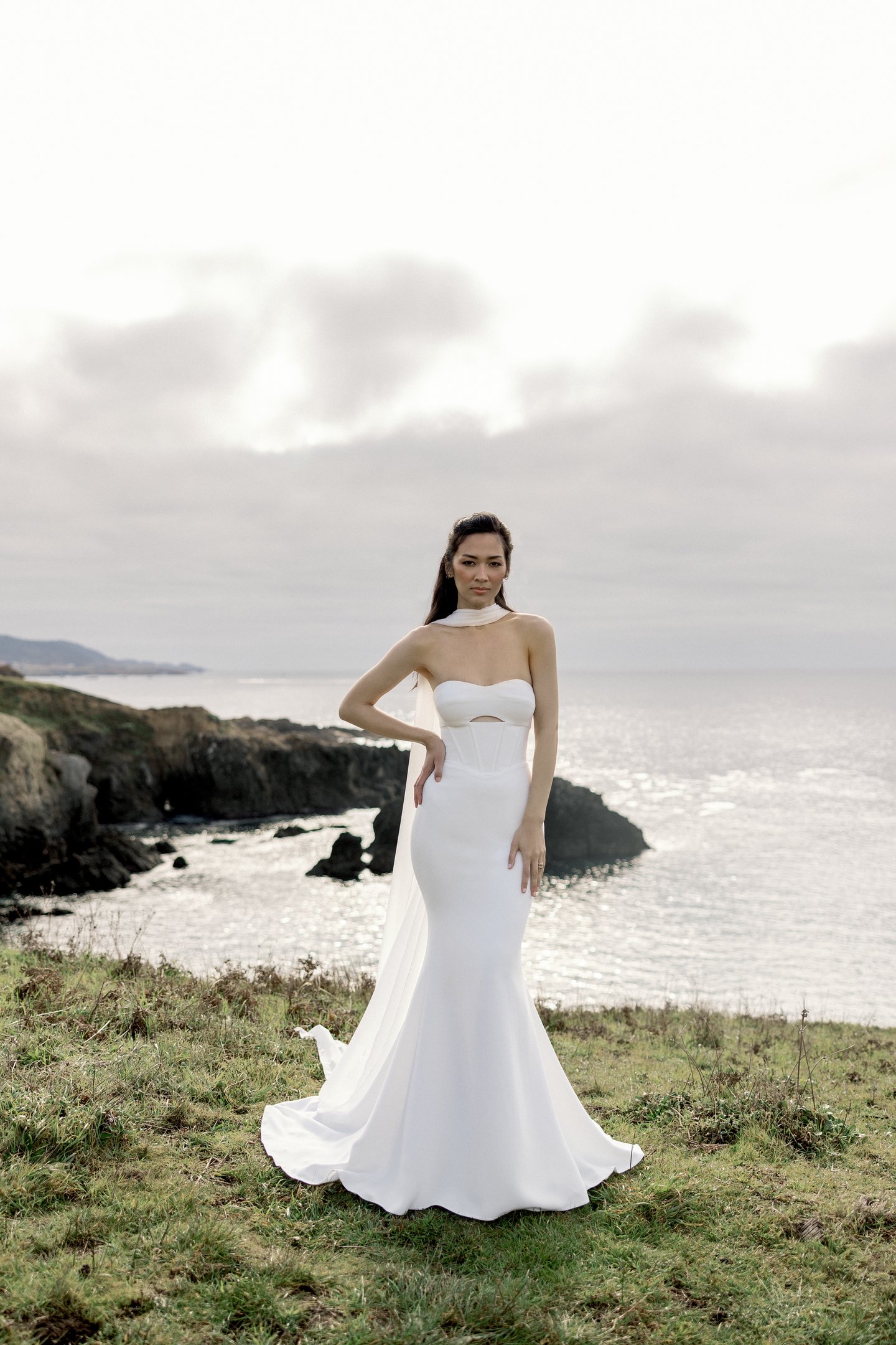 Adore by Justin Alexander Style 11414 Wren Crepe Strapless Fit and Flare with Exposed Boning Cut-Out Detail and Basque Waist