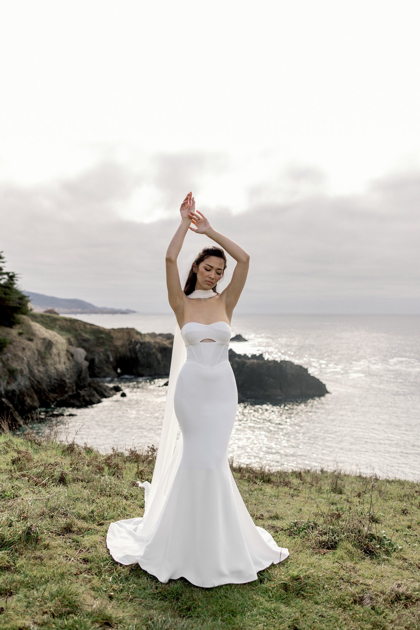 Adore by Justin Alexander Style 11414 Wren Crepe Strapless Fit and Flare with Exposed Boning Cut-Out Detail and Basque Waist