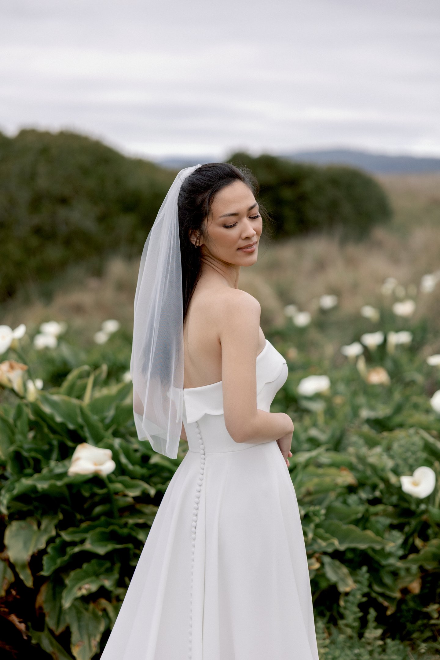 Adore by Justin Alexander Style 11419 Ondine Stretch Crepe A-Line Gown with Scalloped Cuff Neckline and Skirt Slit