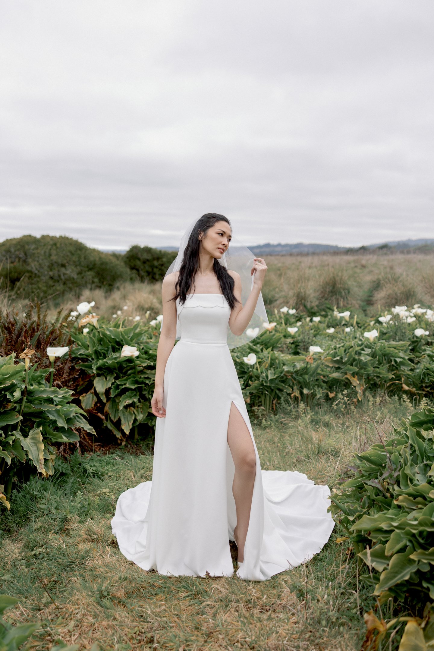 Adore by Justin Alexander Style 11419 Ondine Stretch Crepe A-Line Gown with Scalloped Cuff Neckline and Skirt Slit