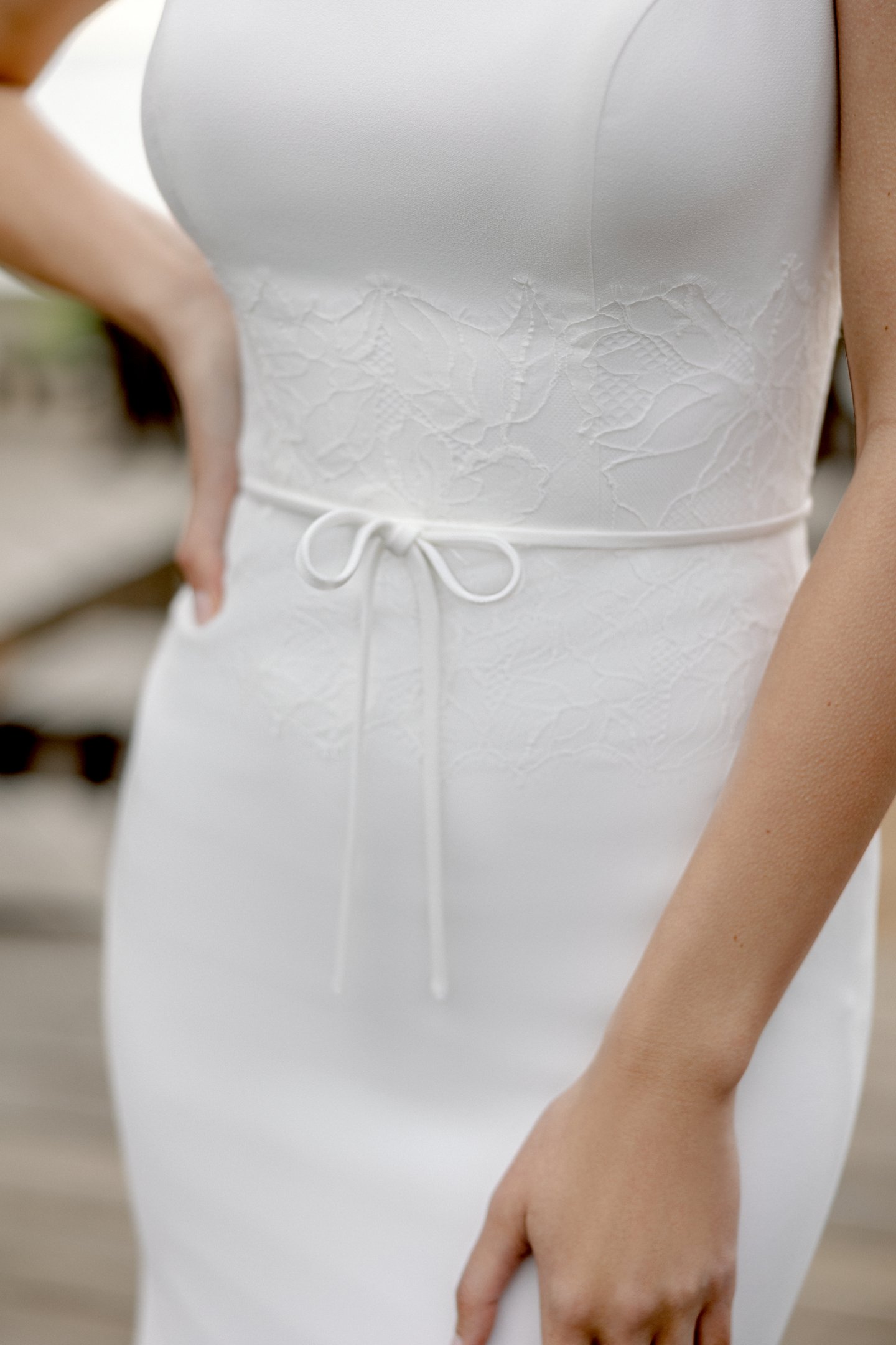 Adore by Justin Alexander Style 11420 Mei Crepe Fit and Flare Bridal Gown with Chantilly Lace and Bow Detail