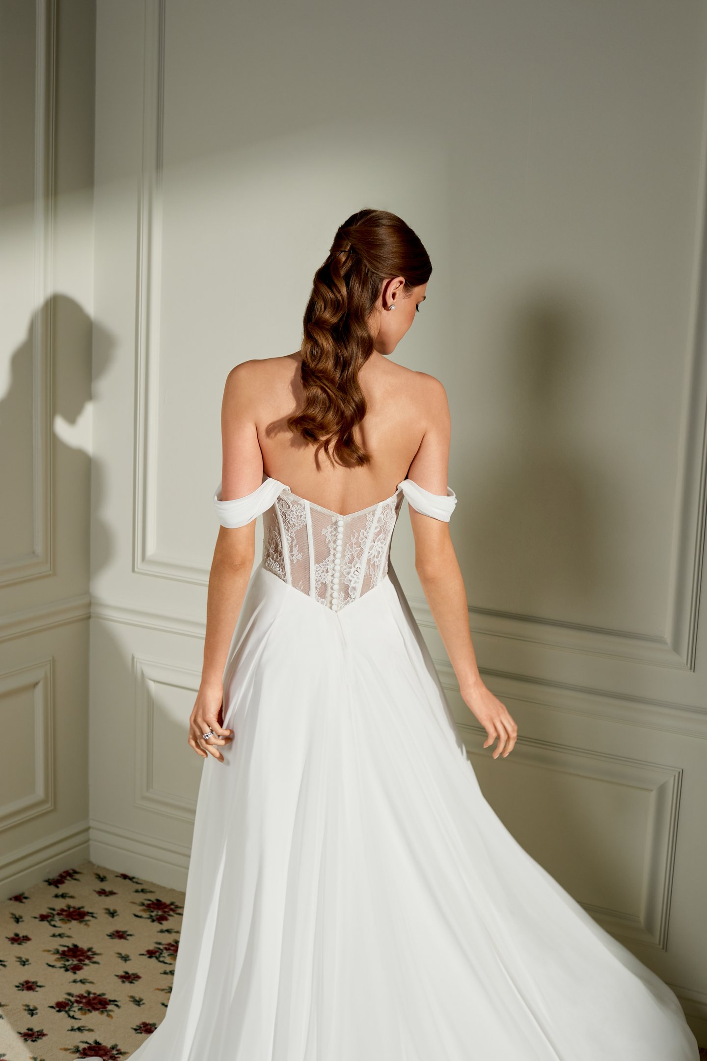 Adore by Justin Alexander Style 11460 Rosemary Chiffon A-Line Bridal Gown with Peek-A-Boo Lace at Strapless Cowl Neckline, Sheer Bodice, and Basque Waistline