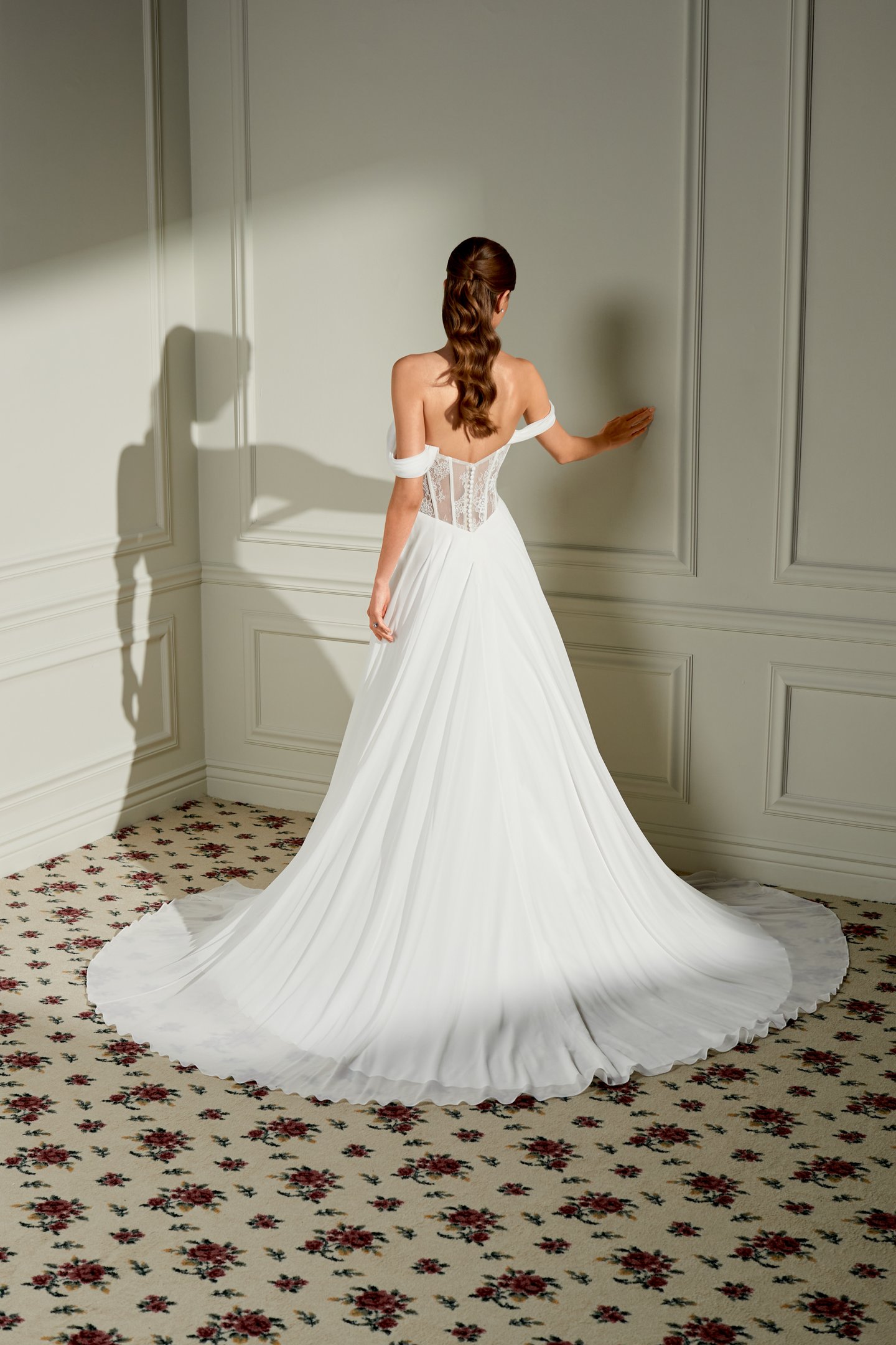 Adore by Justin Alexander Style 11460 Rosemary Chiffon A-Line Bridal Gown with Peek-A-Boo Lace at Strapless Cowl Neckline, Sheer Bodice, and Basque Waistline