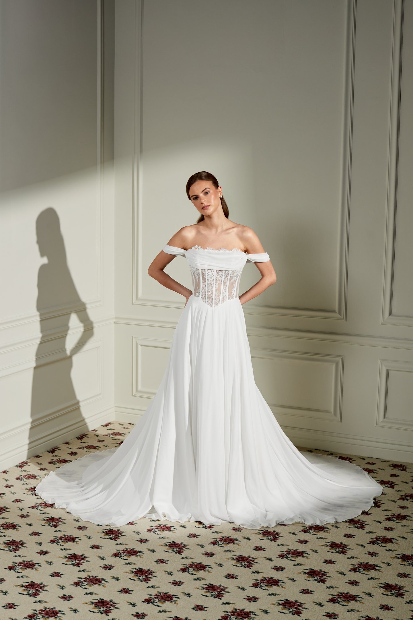 Adore by Justin Alexander Style 11460 Rosemary Chiffon A-Line Bridal Gown with Peek-A-Boo Lace at Strapless Cowl Neckline, Sheer Bodice, and Basque Waistline