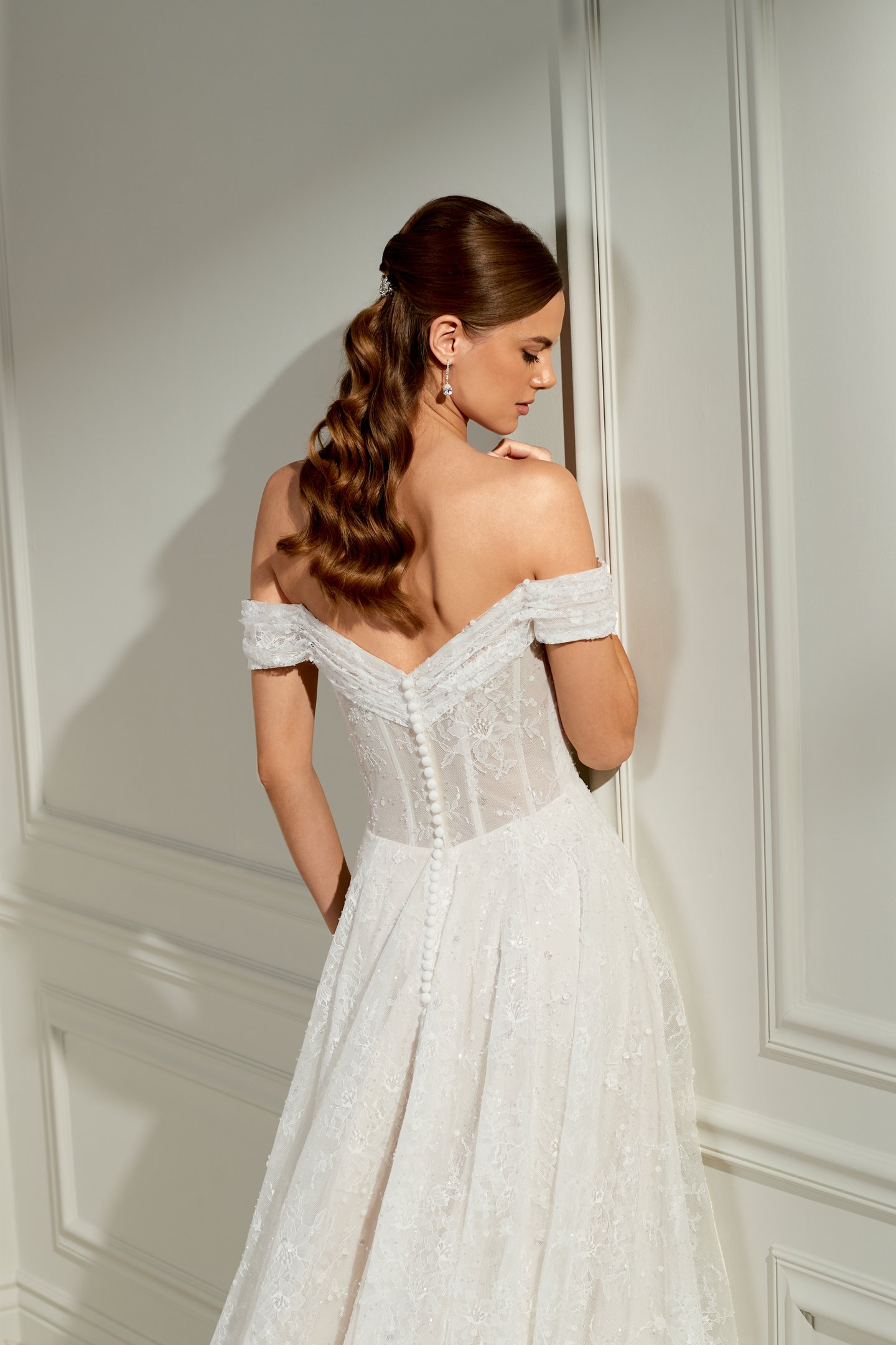 Adore by Justin Alexander Style 11479 Dollie Sparkling Chantilly Lace A-Line Bridal Gown withe Draped Off-the-Shoulder Neckline and Exposed Boning