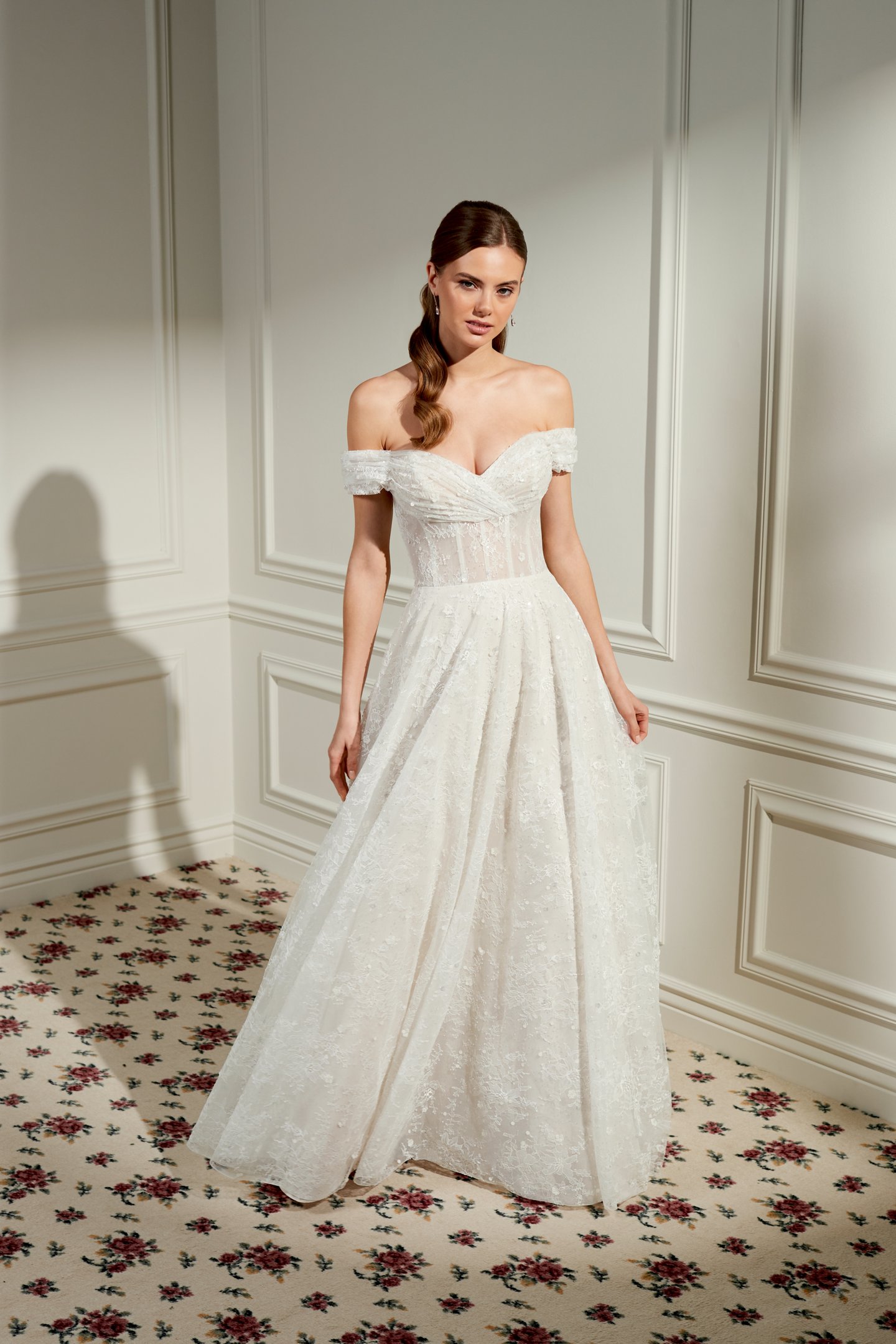 Adore by Justin Alexander Style 11479 Dollie Sparkling Chantilly Lace A-Line Bridal Gown withe Draped Off-the-Shoulder Neckline and Exposed Boning