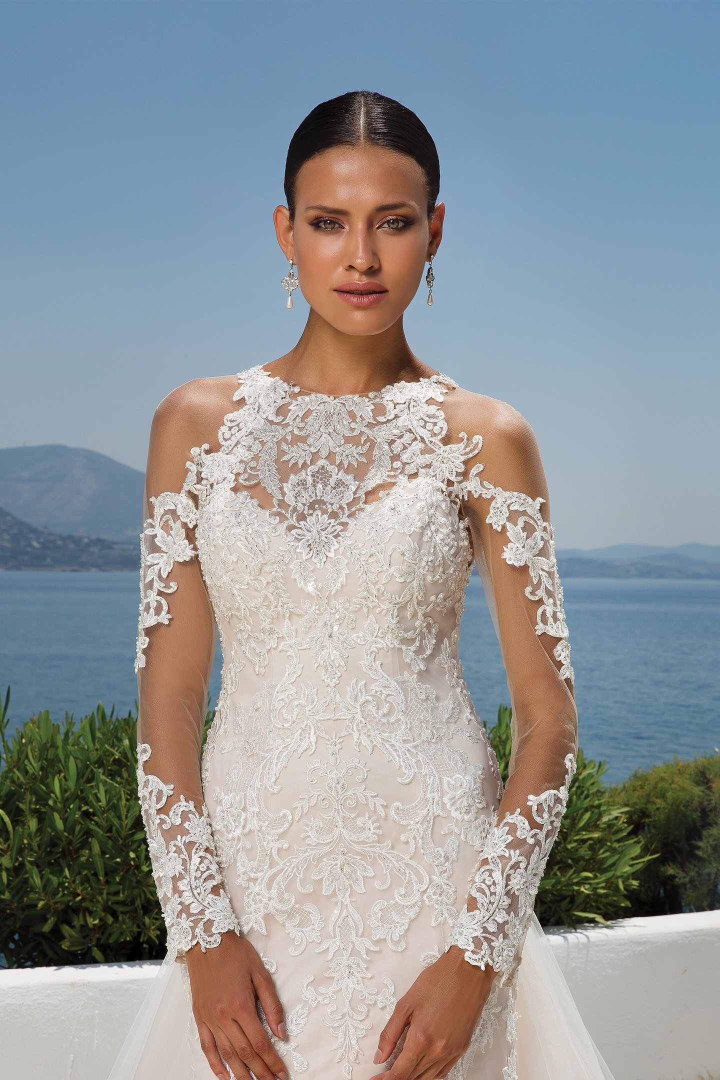Justin Alexander Style 8964 Beaded Lace Jewel Neck Gown with Cold Shoulder, Illusion Lace Sleeves and Detachable Train