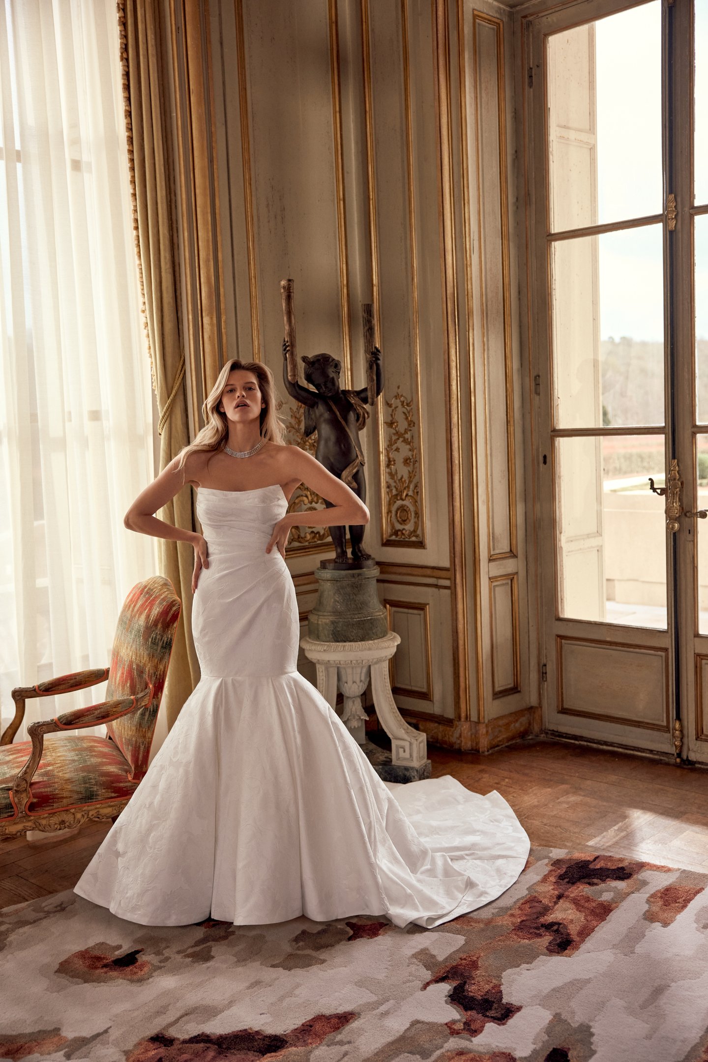 Justin Alexander Style 88536 Nori Brocade Trumpet Gown with Asymmetrical Ruching on Bodice and Dramatic Mermaid Skirt