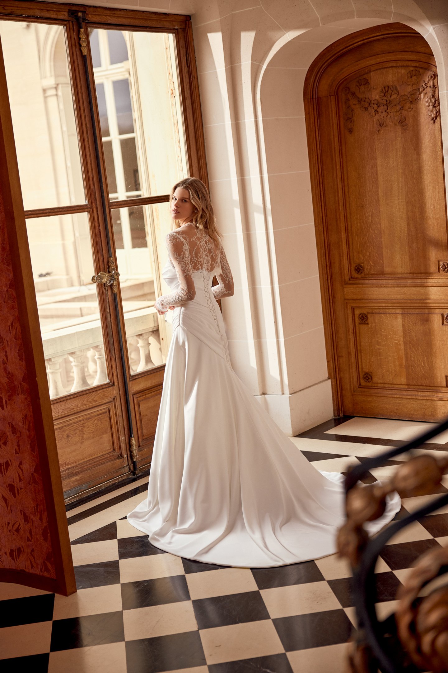 Justin Alexander Style 88541 Norelle Charmeuse A-Line Gown with Asymmetrical Draped Bodice and Waistline with Corset Back