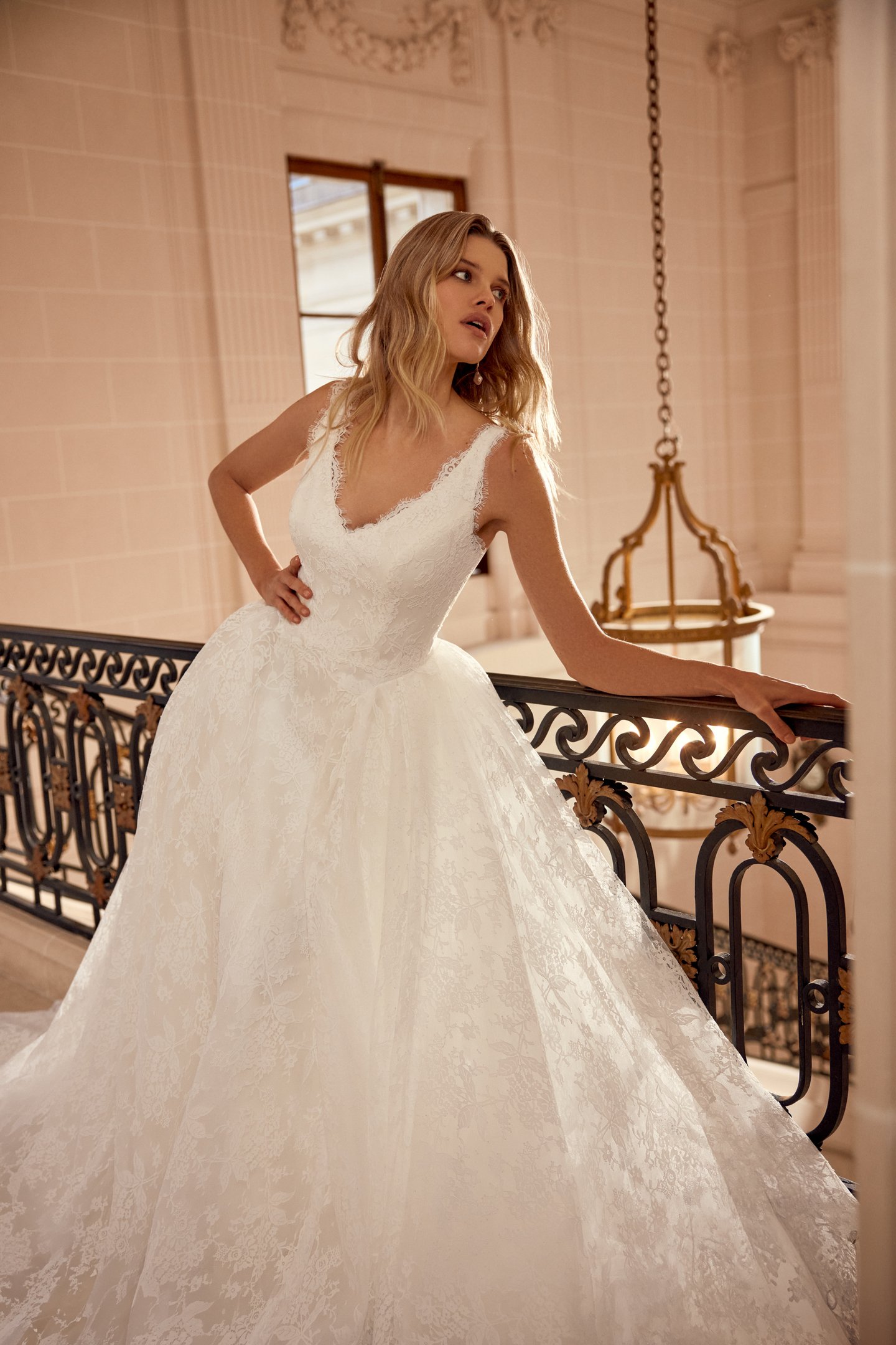 Justin Alexander Style 88543 Natalina Matte Allover Lace Ball Gown with V-Neckline and Dramatic Waterfall Waistline with Detachable Hip Puffs