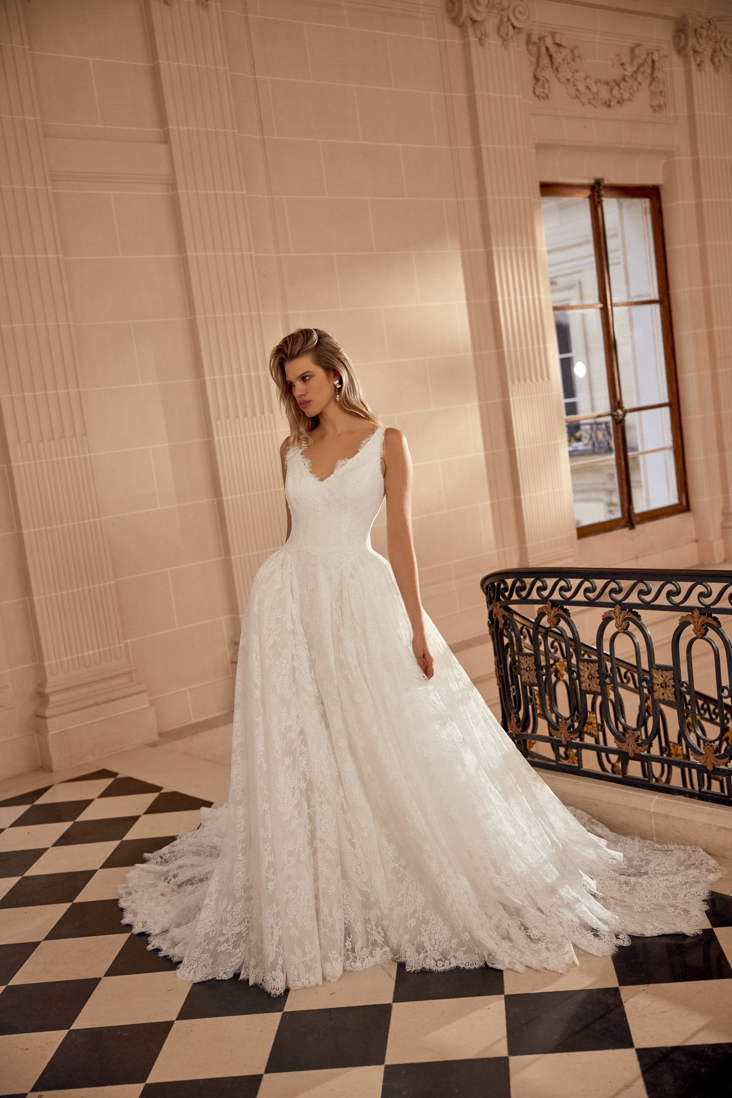Justin Alexander Style 88543 Natalina Matte Allover Lace Ball Gown with V-Neckline and Dramatic Waterfall Waistline with Detachable Hip Puffs