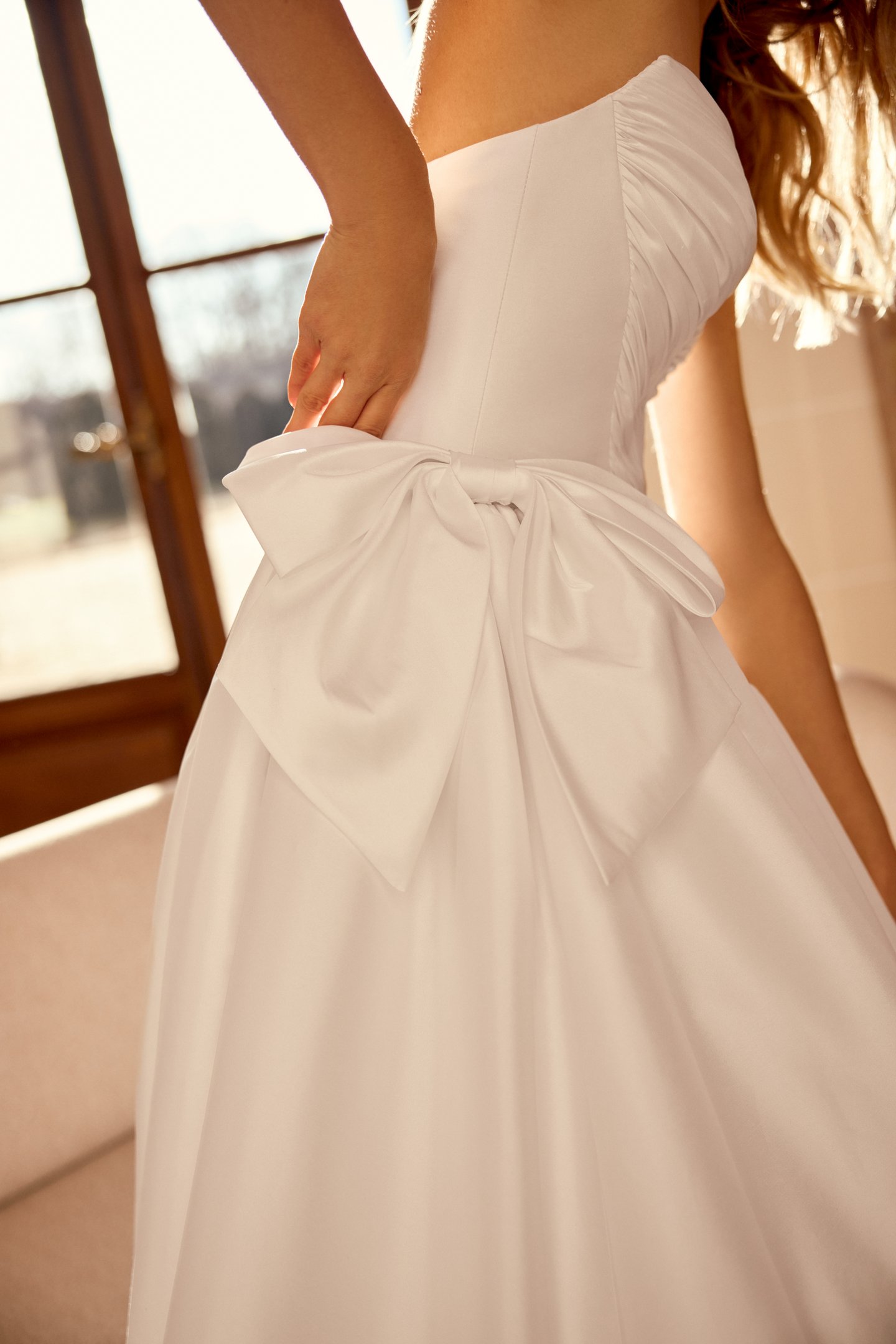 Justin Alexander Style 88545 Naomi Taffeta Ball Gown with Tightly Pleated Bodice and Gathered Skirt with Bow Accents