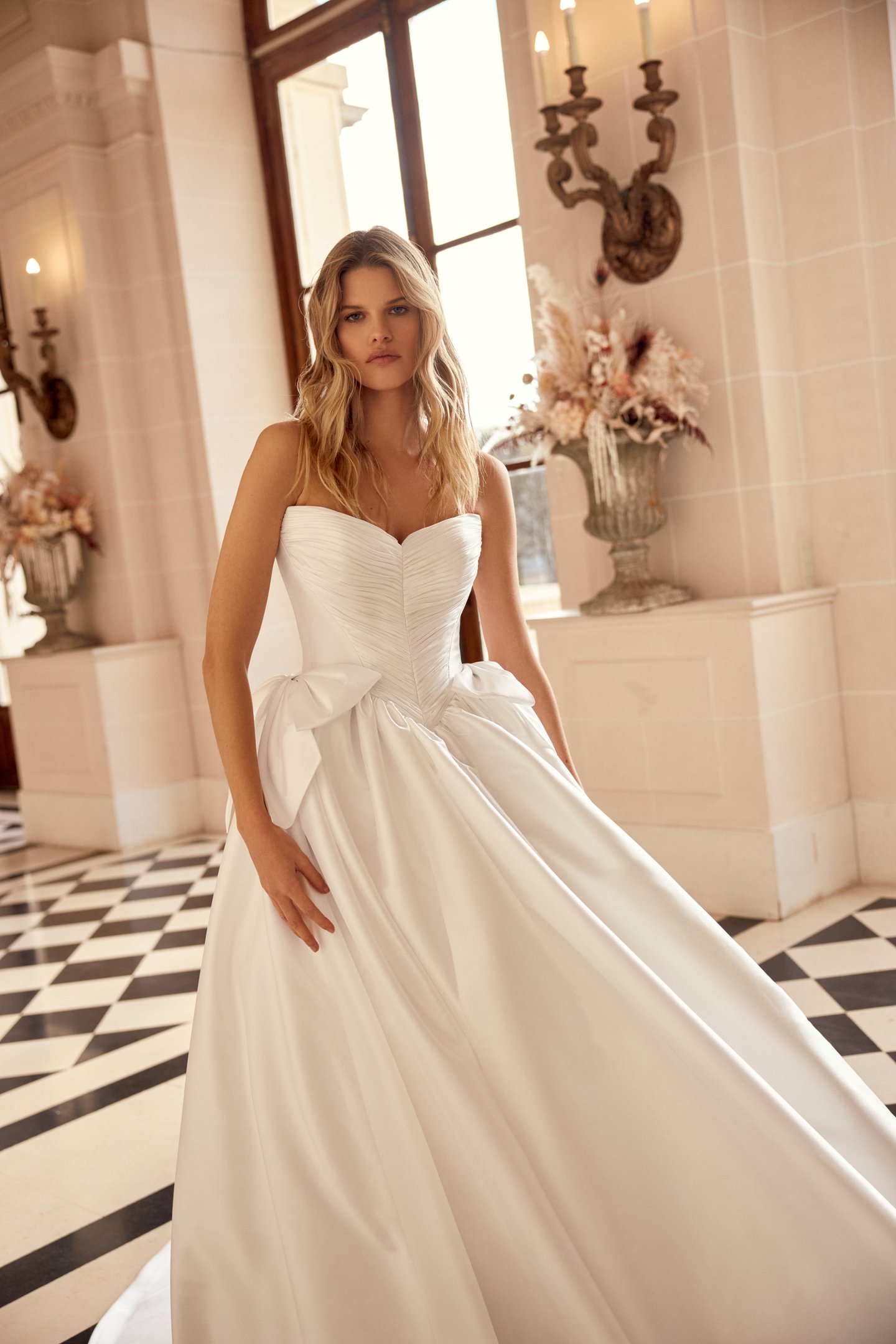 Justin Alexander Style 88545 Naomi Taffeta Ball Gown with Tightly Pleated Bodice and Gathered Skirt with Bow Accents
