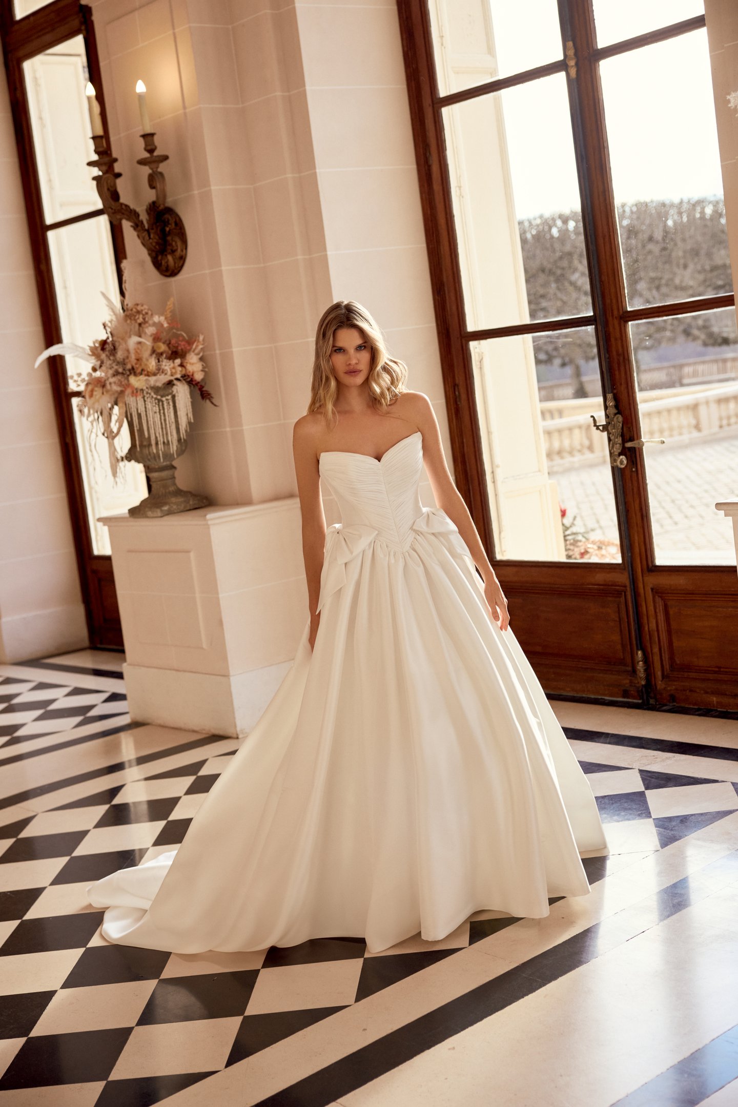 Justin Alexander Style 88545 Naomi Taffeta Ball Gown with Tightly Pleated Bodice and Gathered Skirt with Bow Accents