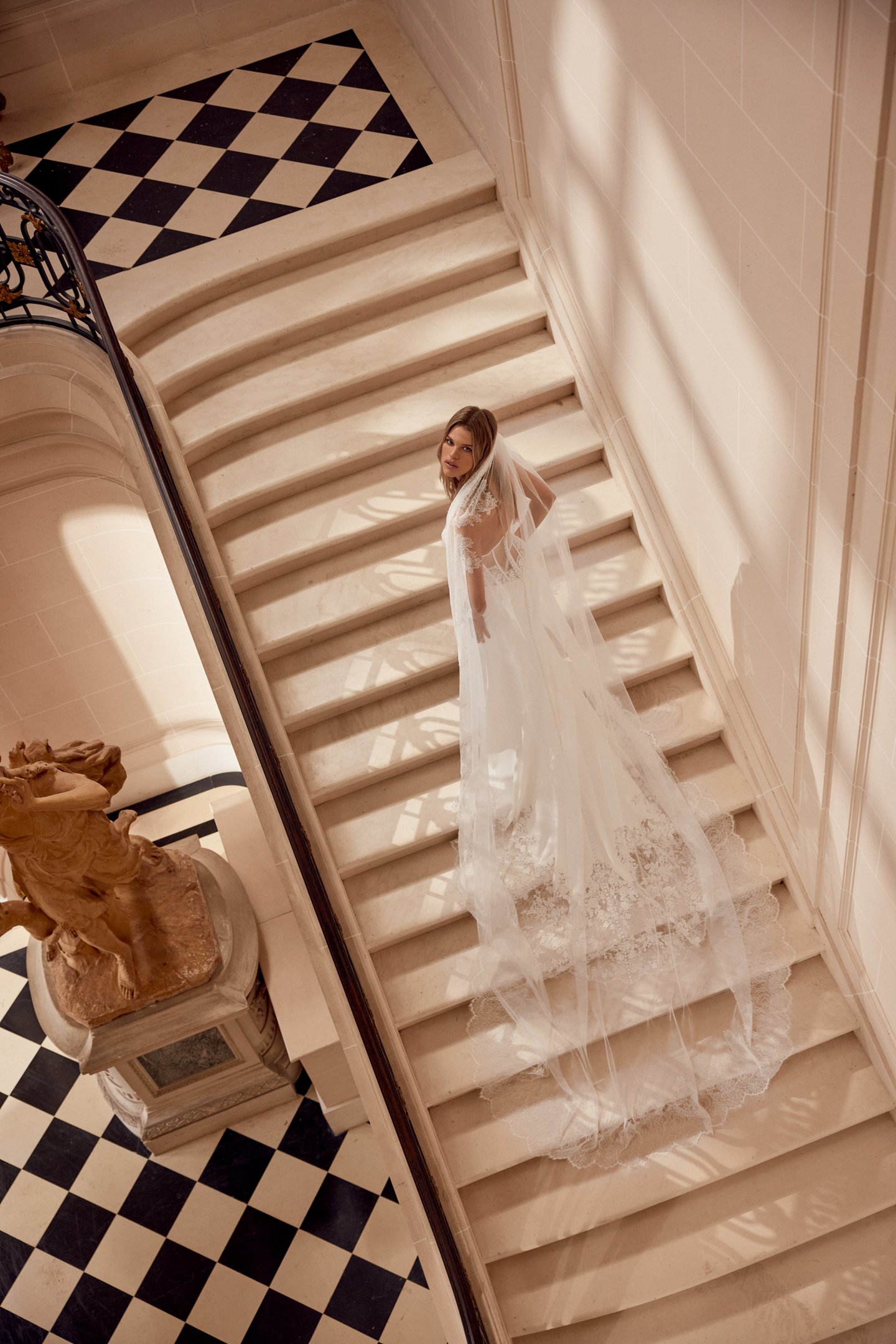 Justin Alexander Style 88547 Nina Crepe Fit and Flare Gown with Sheer Bodice and Exposed Boning with Basque Waistline