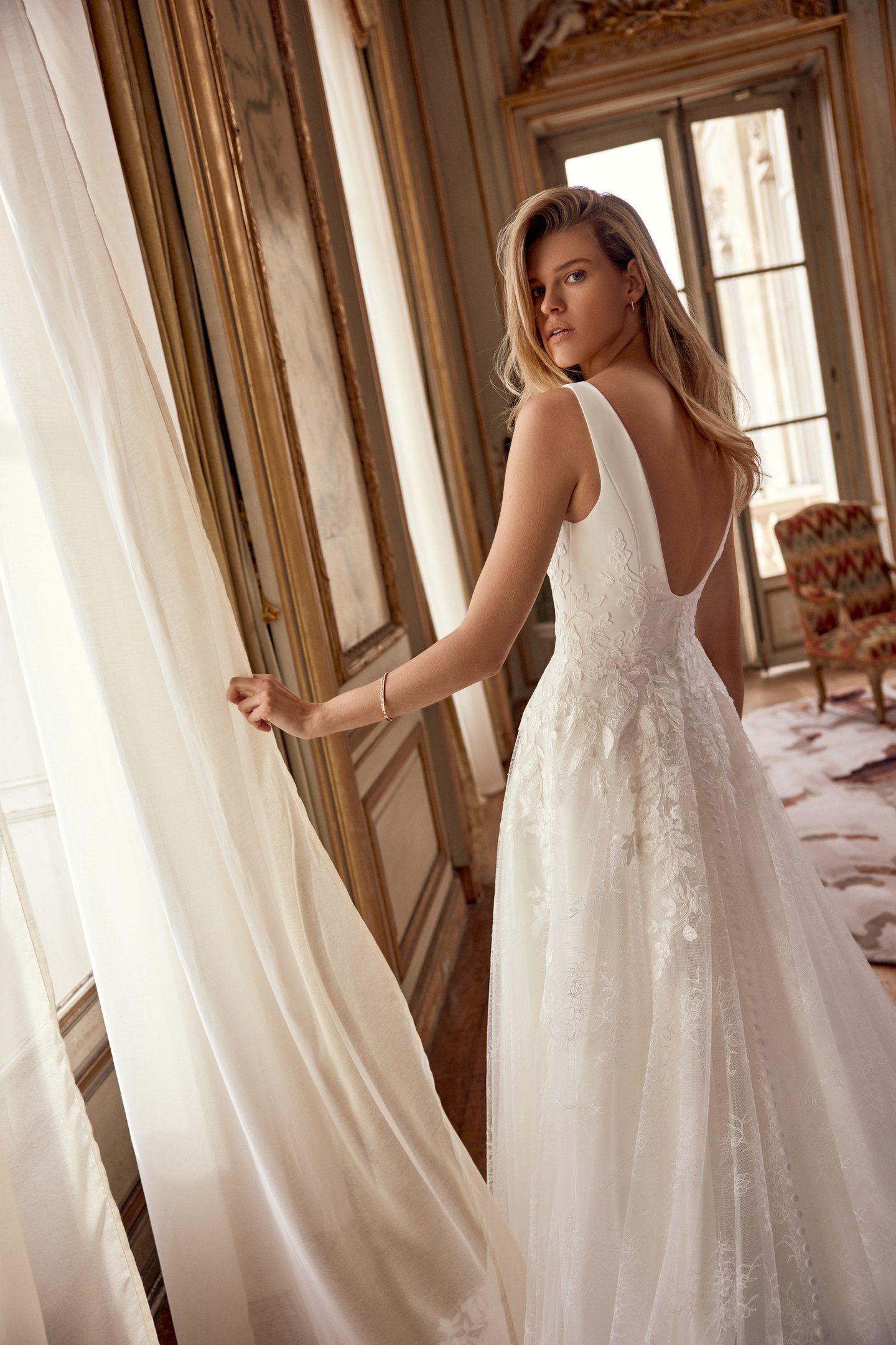 Justin Alexander Style 88549 Neve A-Line Gown with Sabrina Neckline, Crepe Bodice with Floral Lace Appliqués, and Chantilly Lace Skirt