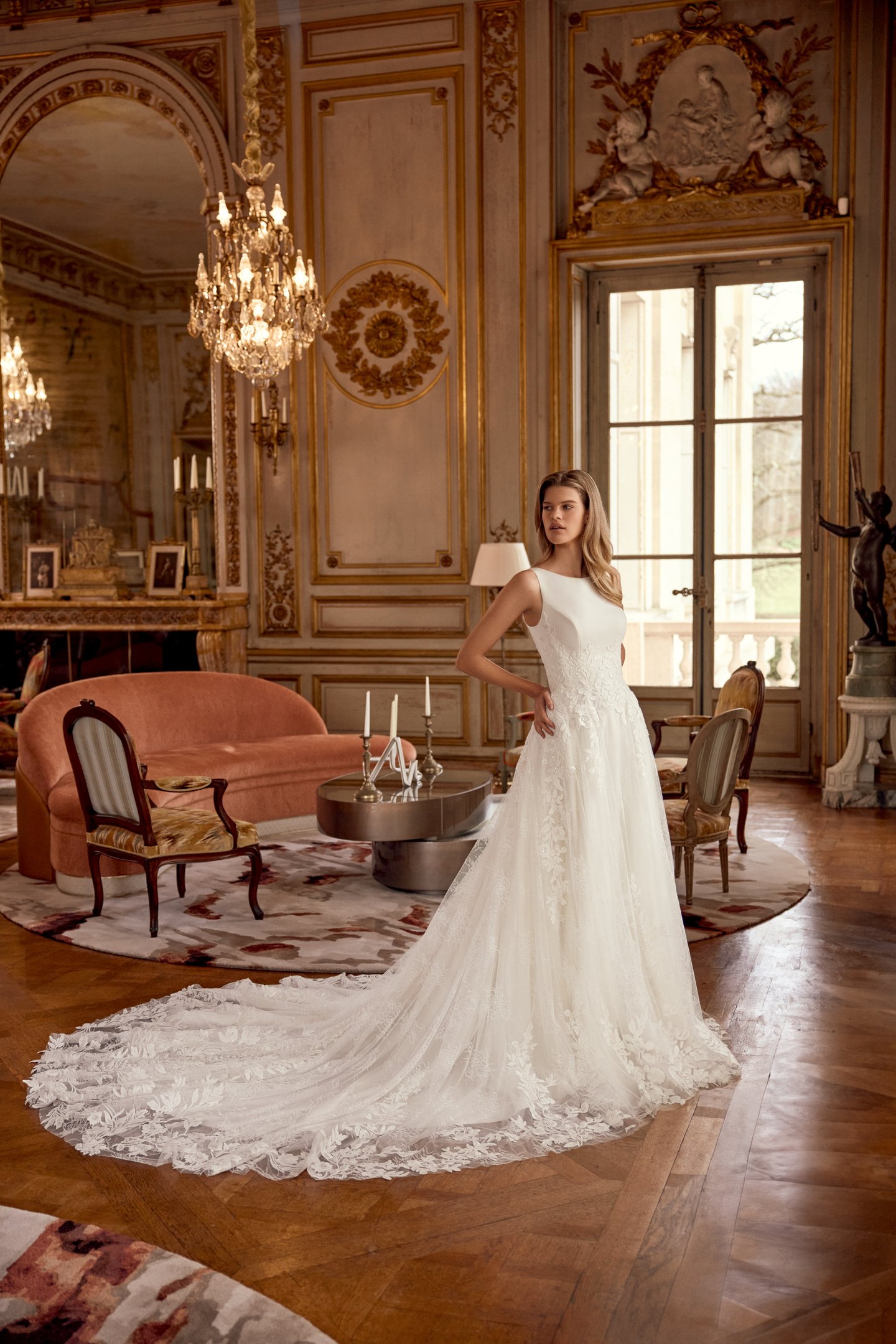Justin Alexander Style 88549 Neve A-Line Gown with Sabrina Neckline, Crepe Bodice with Floral Lace Appliqués, and Chantilly Lace Skirt