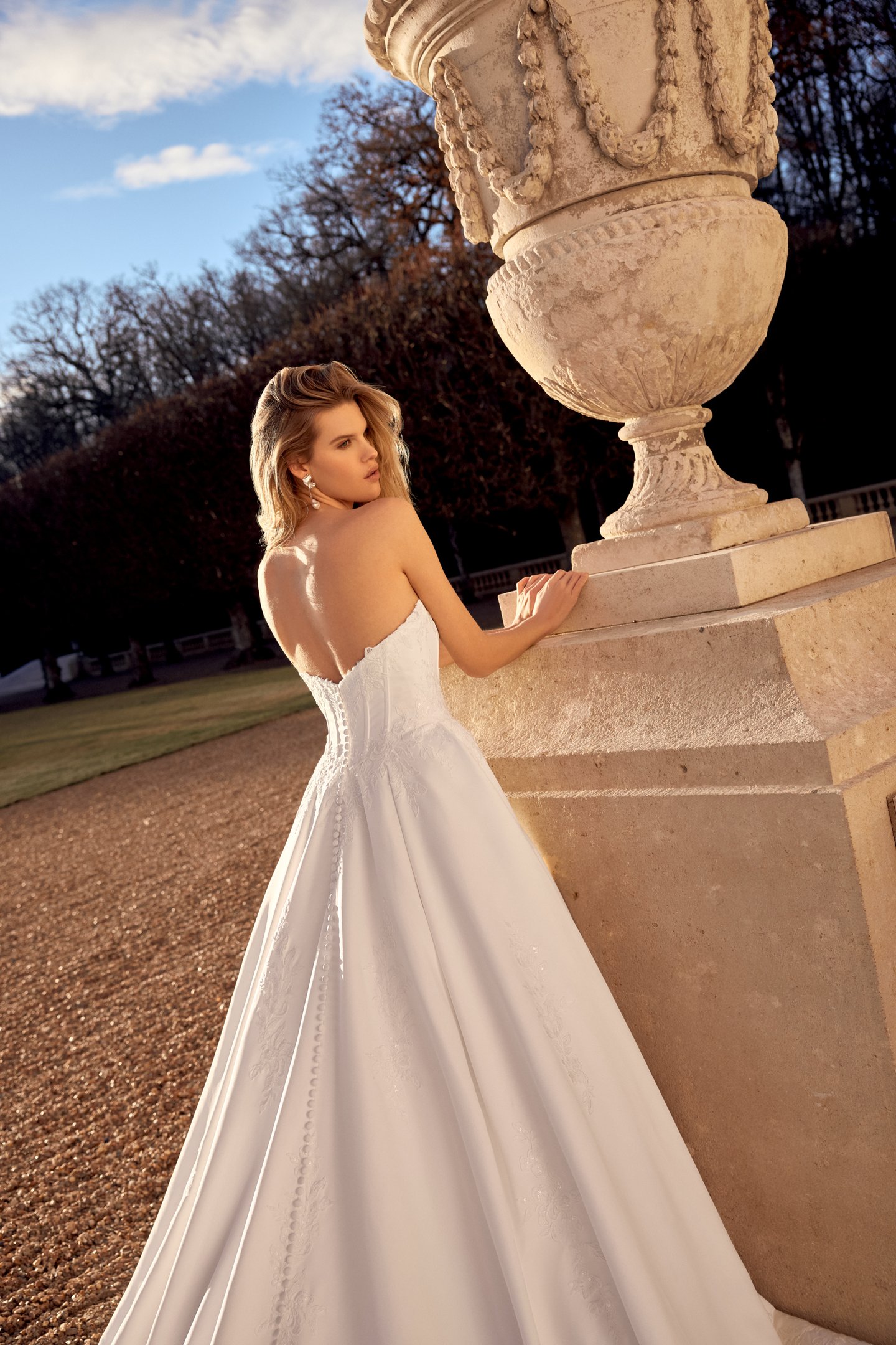 Justin Alexander Style 88551 Nolan Satin Ball Gown with Cat Eye Neckline, Corset Bodice, and Exposed Boning
