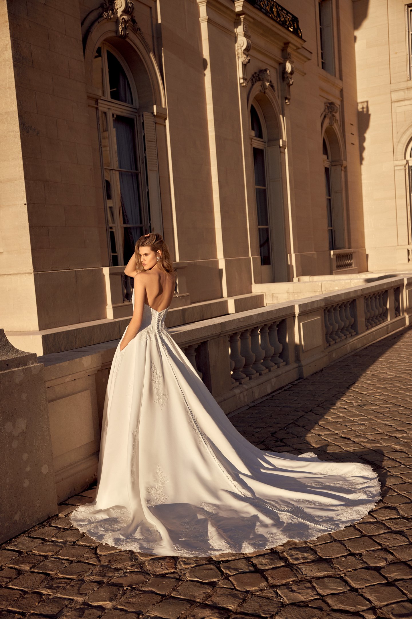 Justin Alexander Style 88551 Nolan Satin Ball Gown with Cat Eye Neckline, Corset Bodice, and Exposed Boning