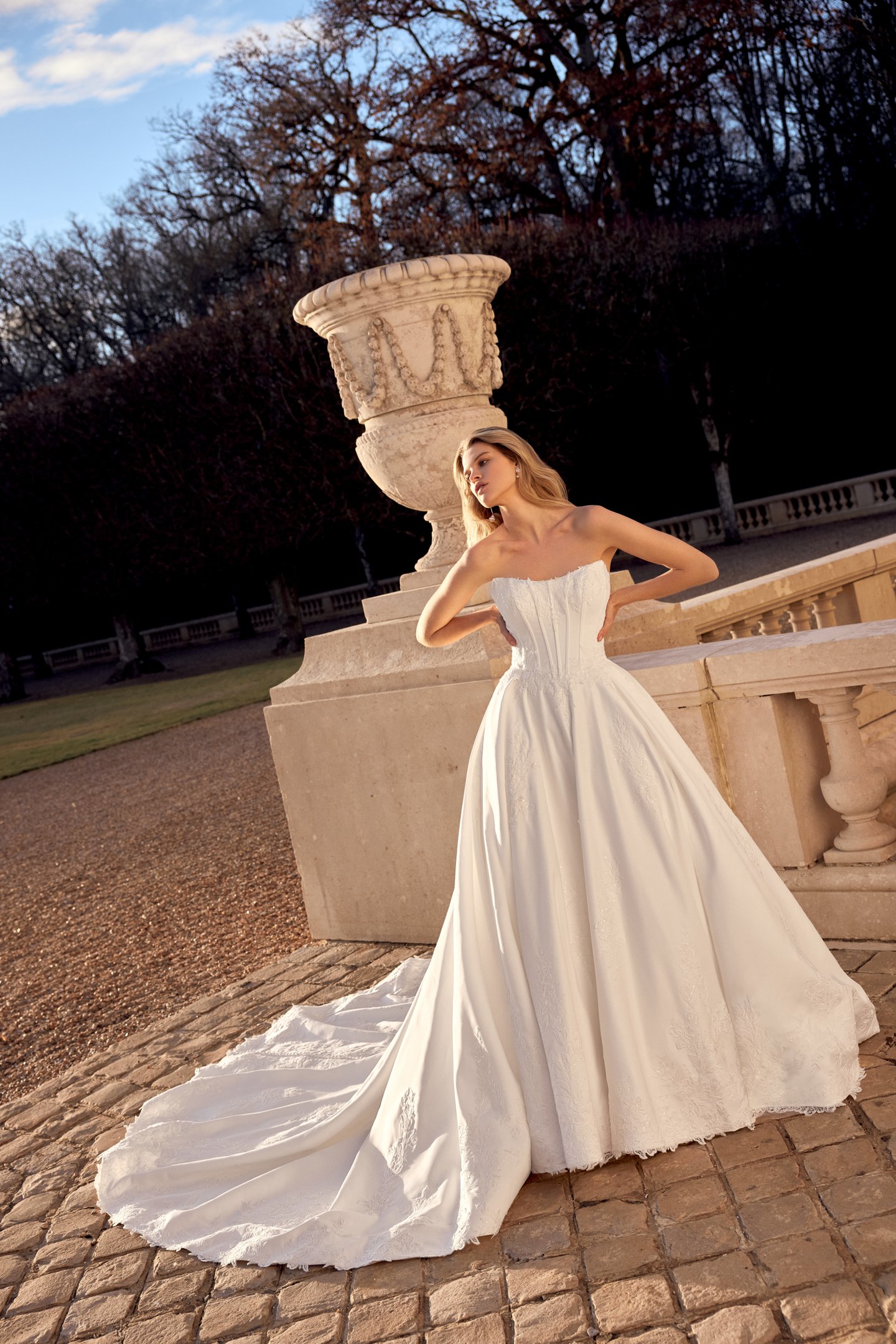 Justin Alexander Style 88551 Nolan Satin Ball Gown with Cat Eye Neckline, Corset Bodice, and Exposed Boning