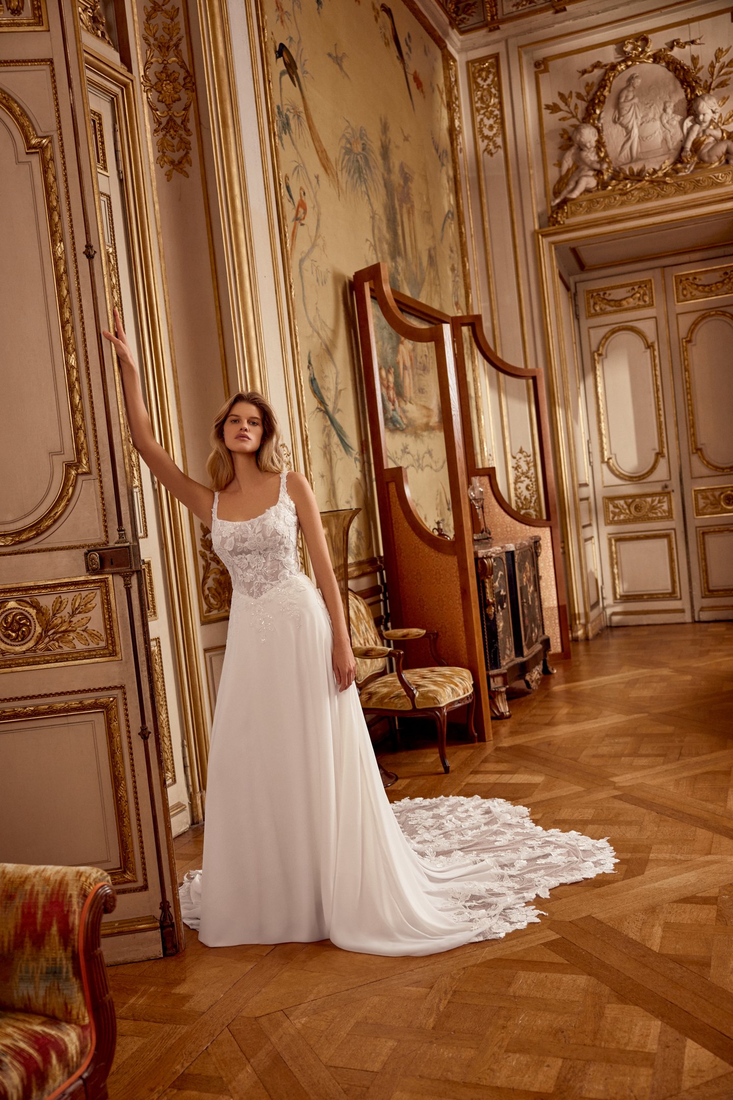 Justin Alexander Style 88554 Nivara Sparkling Chiffon A-Line Gown with Beaded and Sequined Appliqués on Bodice with Dramatic Cut-Out Train