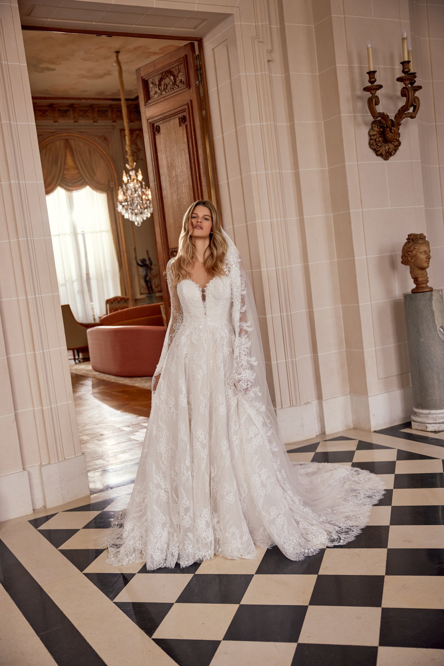 Justin Alexander Style 88557 Nela Allover Alençon Corded Lace A-Line Gown with Plunging Queen Anne Neckline and Illusion Keyhole Back