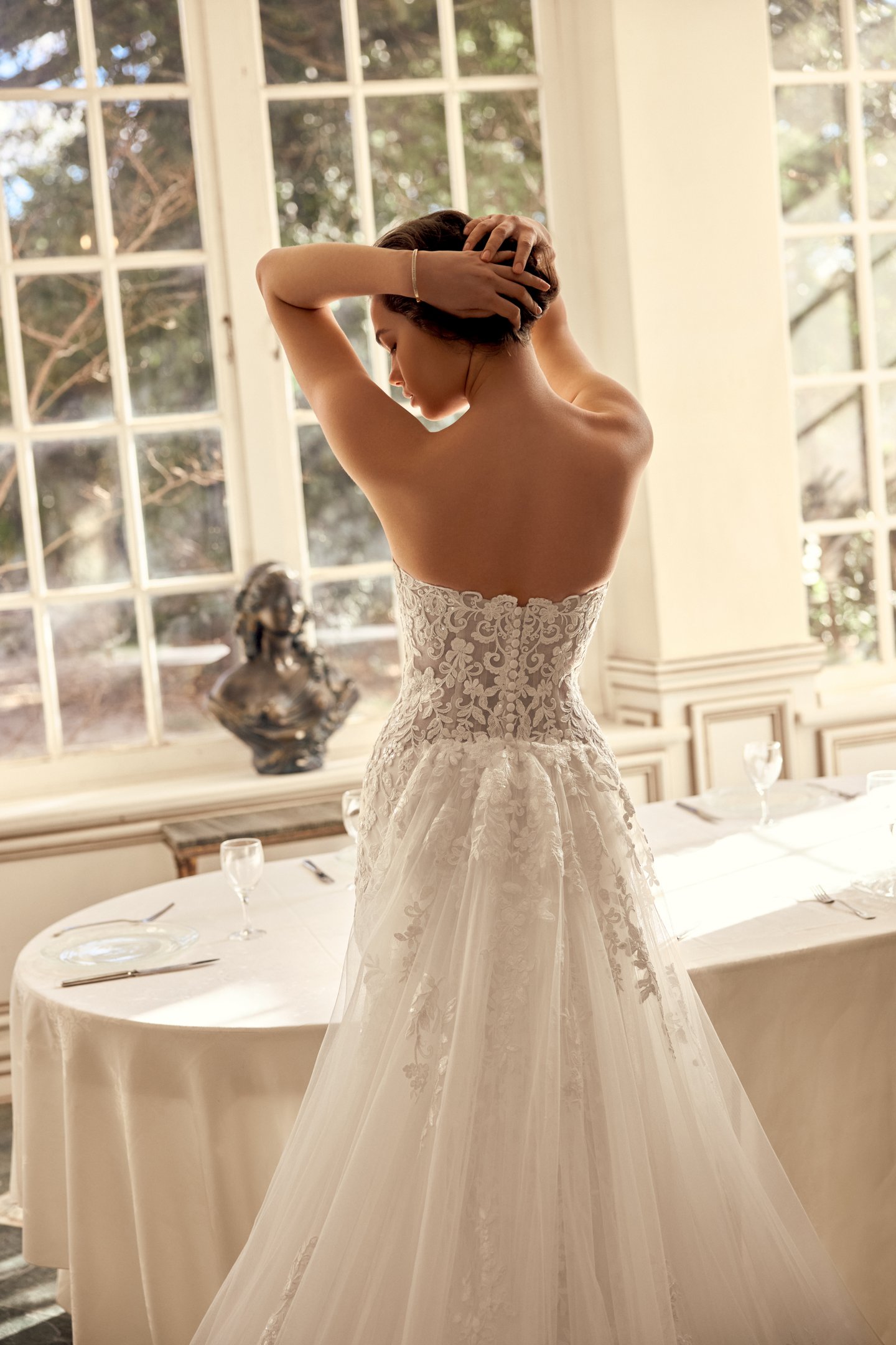 Justin Alexander Style 88558 Natalia Sequined Lace Fit and Flare With Strapless Scalloped Neckline and Chapel Length Train with Pointed Detail