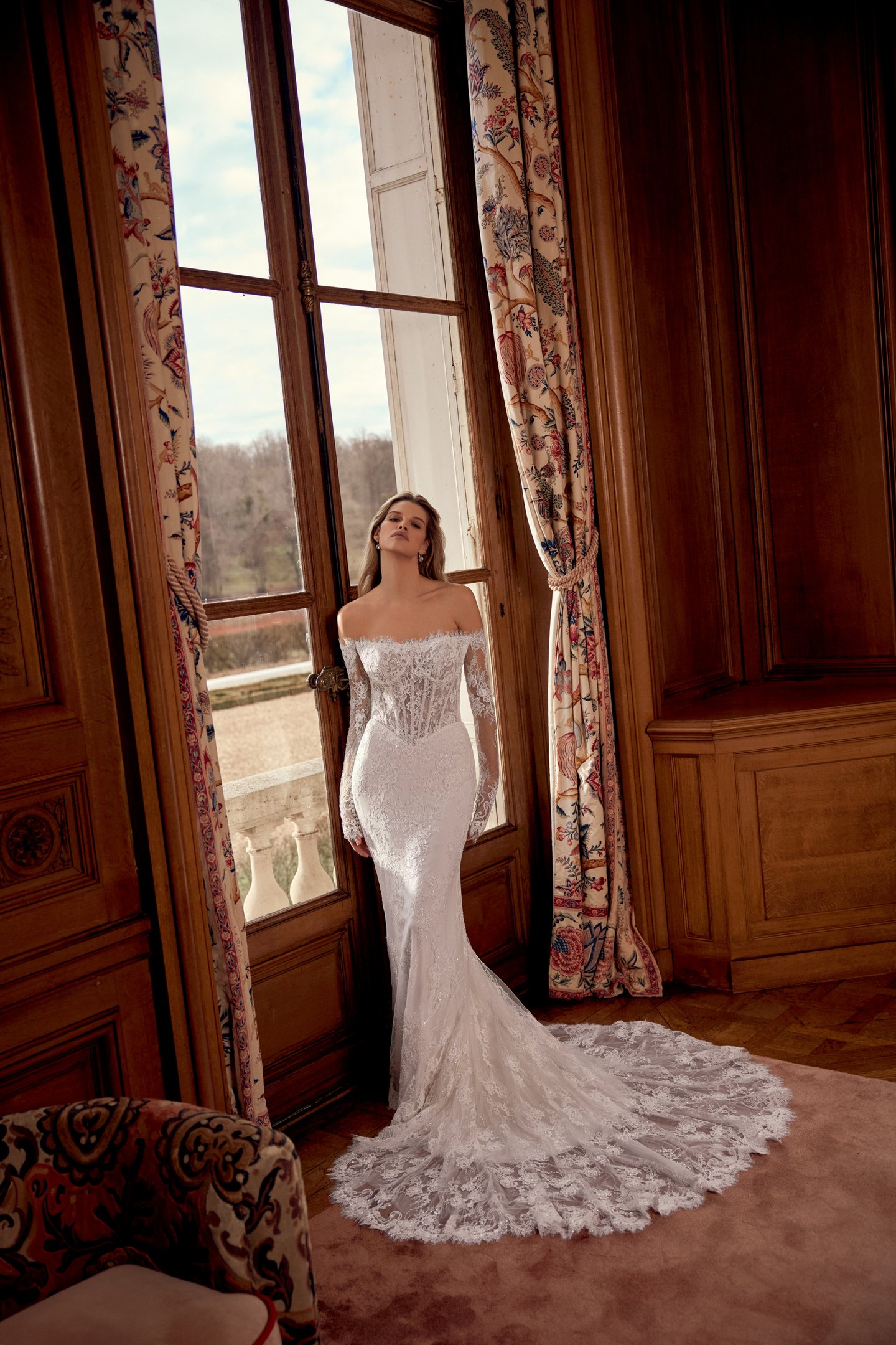 Justin Alexander Style 88561 Nicoletta Allover Corded Lace Fit and Flare Gown with Long Sleeves and Sheer Bodice with Demicups