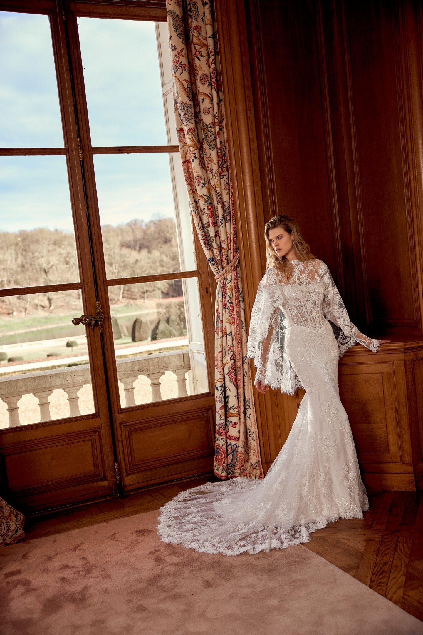 Justin Alexander Style 88561 Nicoletta Allover Corded Lace Fit and Flare Gown with Long Sleeves and Sheer Bodice with Demicups