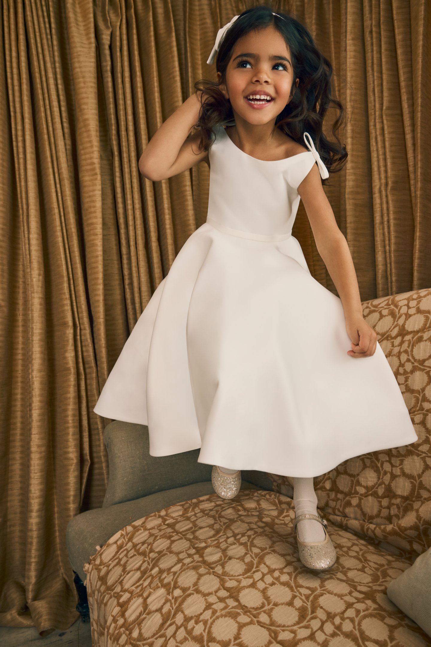 Fable by Justin Alexander Style FG003 Avel Tea Length Satin A-Line Dress with Matching Satin Bows on Shoulders  and Back