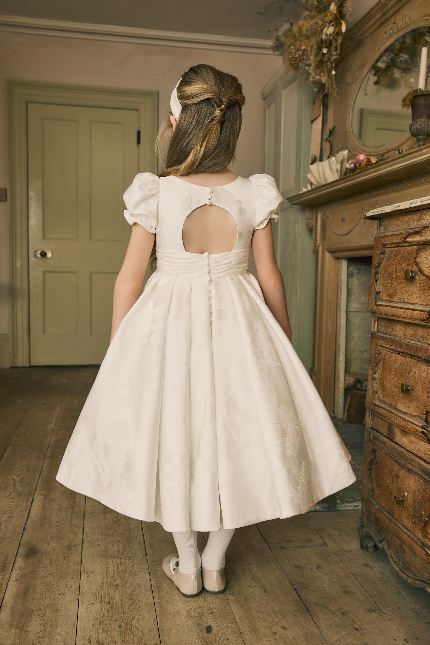 Fable by Justin Alexander Style FG005 Josie Brocade A-Line Tea Length Dress with Gathered Puff Sleeves, Pleated Cummerbund, and Keyhole Back