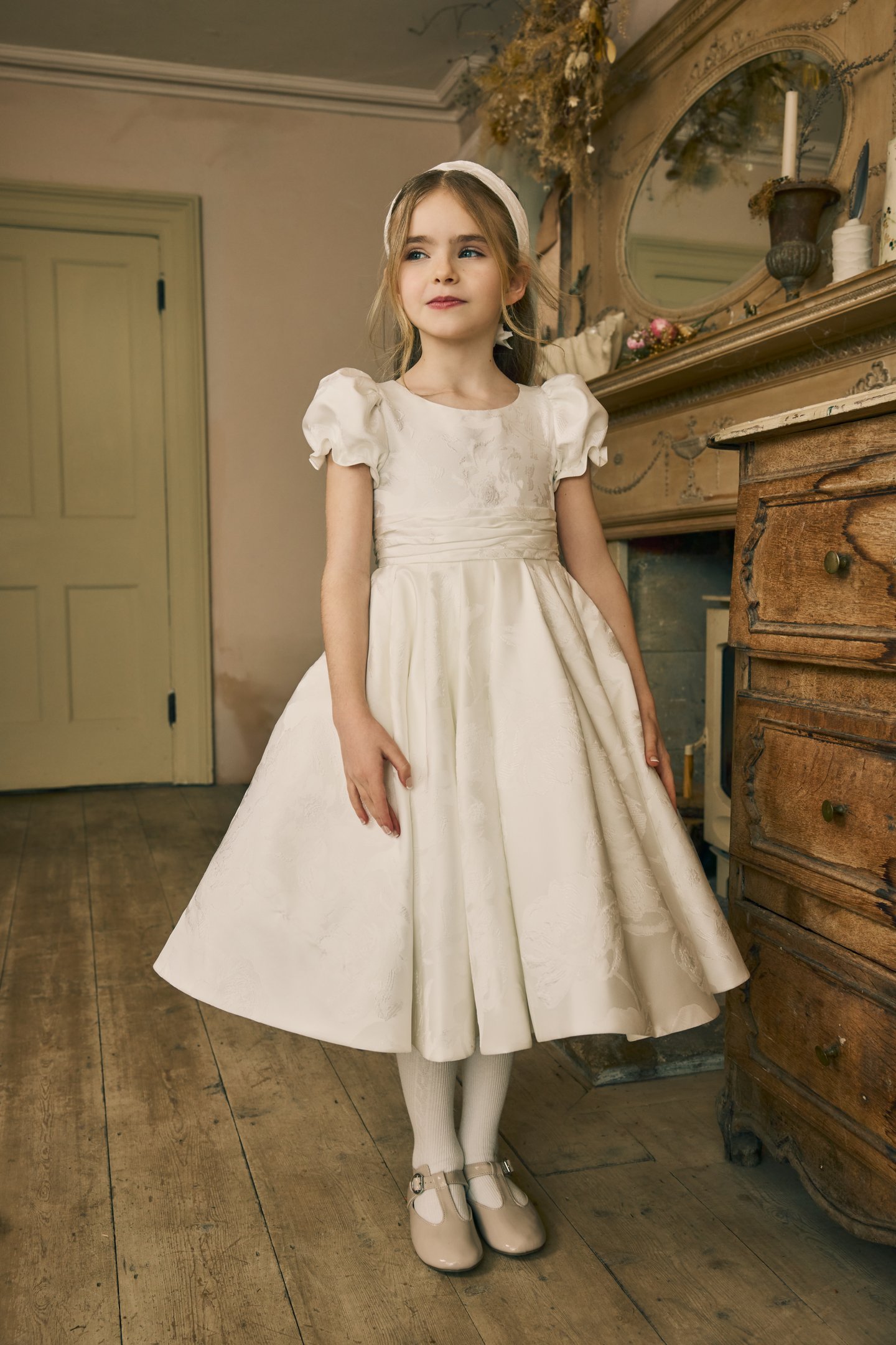 Fable by Justin Alexander Style FG005 Josie Brocade A-Line Tea Length Dress with Gathered Puff Sleeves, Pleated Cummerbund, and Keyhole Back