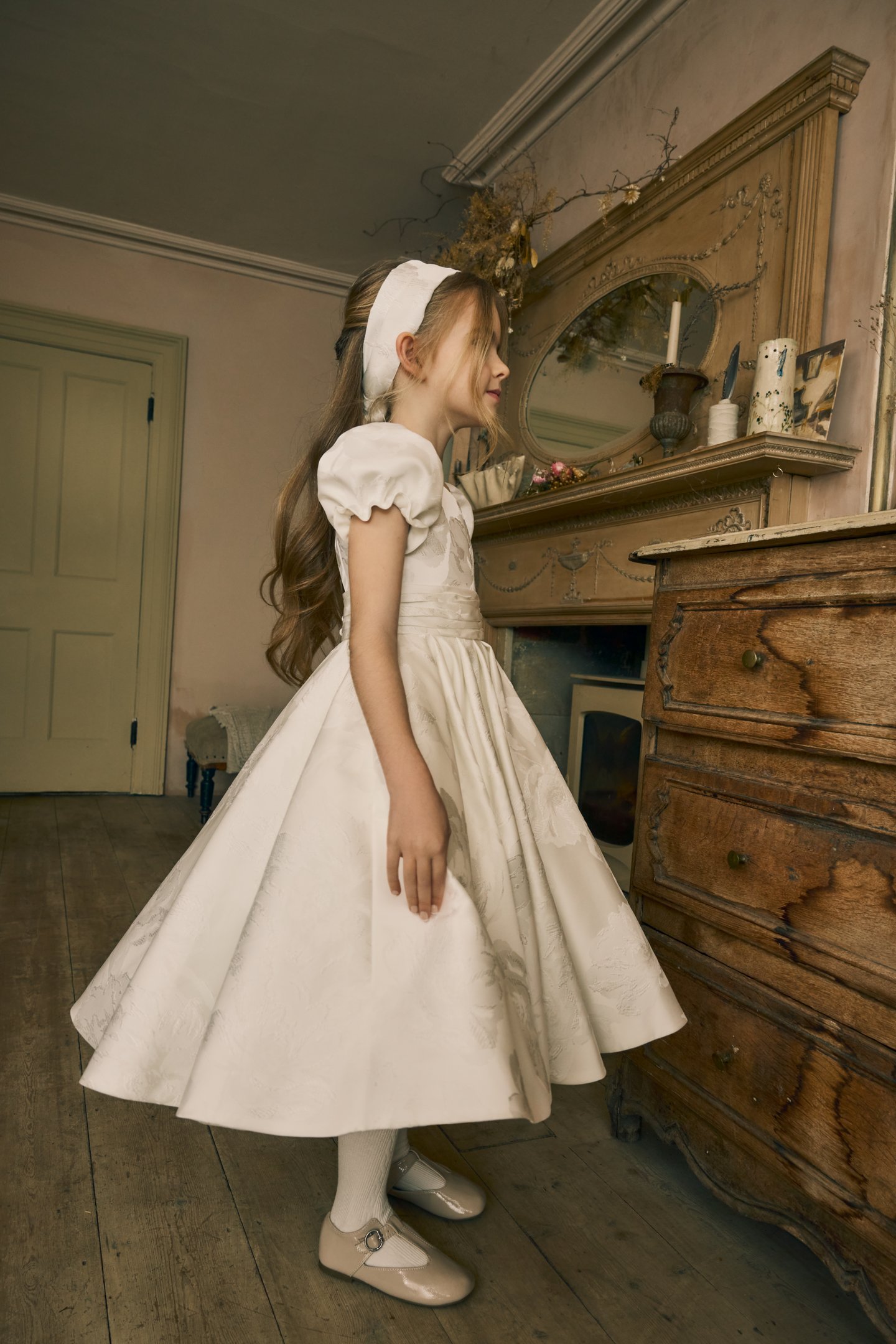 Fable by Justin Alexander Style FG005 Josie Brocade A-Line Tea Length Dress with Gathered Puff Sleeves, Pleated Cummerbund, and Keyhole Back