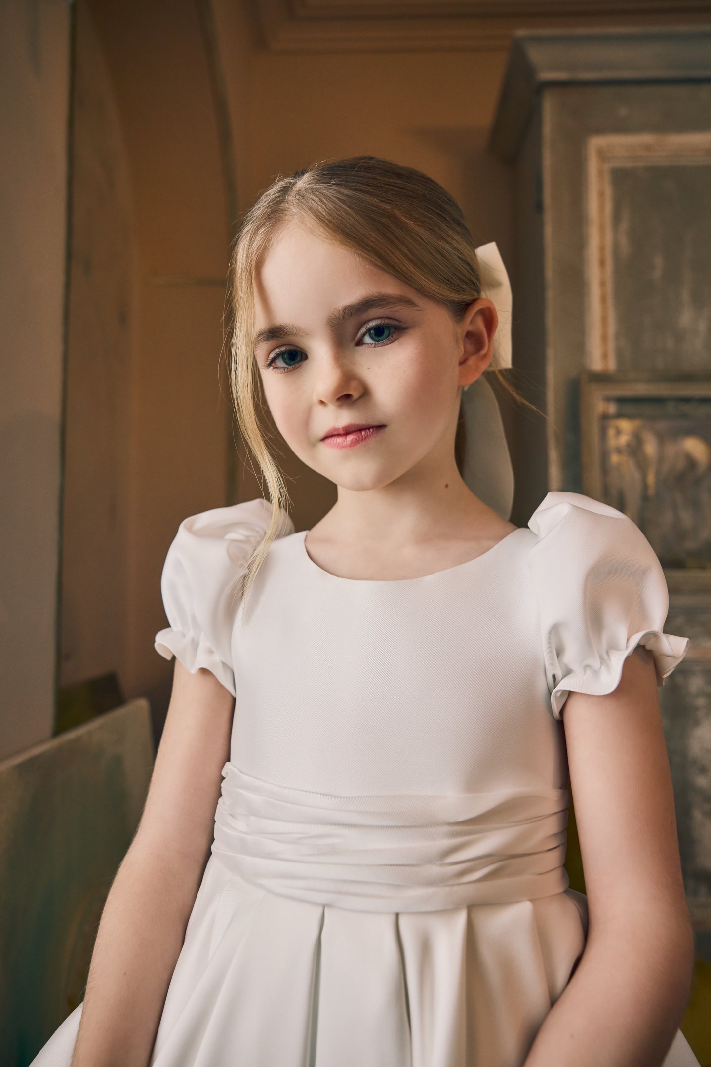 Fable by Justin Alexander Style FG005A Josie Mikado A-Line Tea Length Dress with Gathered Puff Sleeves, Pleated Cummerbund, and Keyhole Back.