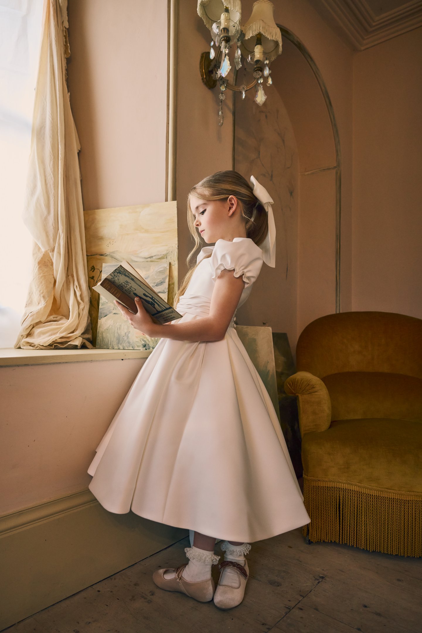 Fable by Justin Alexander Style FG005A Josie Mikado A-Line Tea Length Dress with Gathered Puff Sleeves, Pleated Cummerbund, and Keyhole Back.