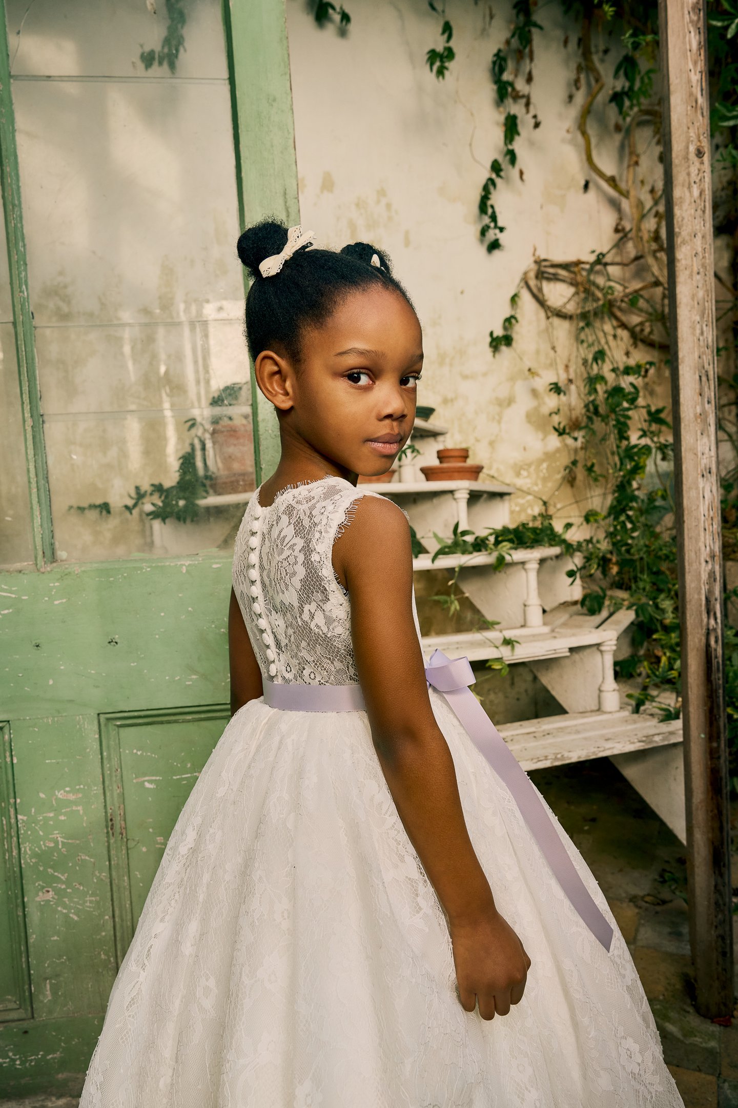 Fable by Justin Alexander Style FG007 Blossom Chantilly Lace Tea Length A-Line Dress with Illusion Back and Eyelash Trim at Neckline and Hem