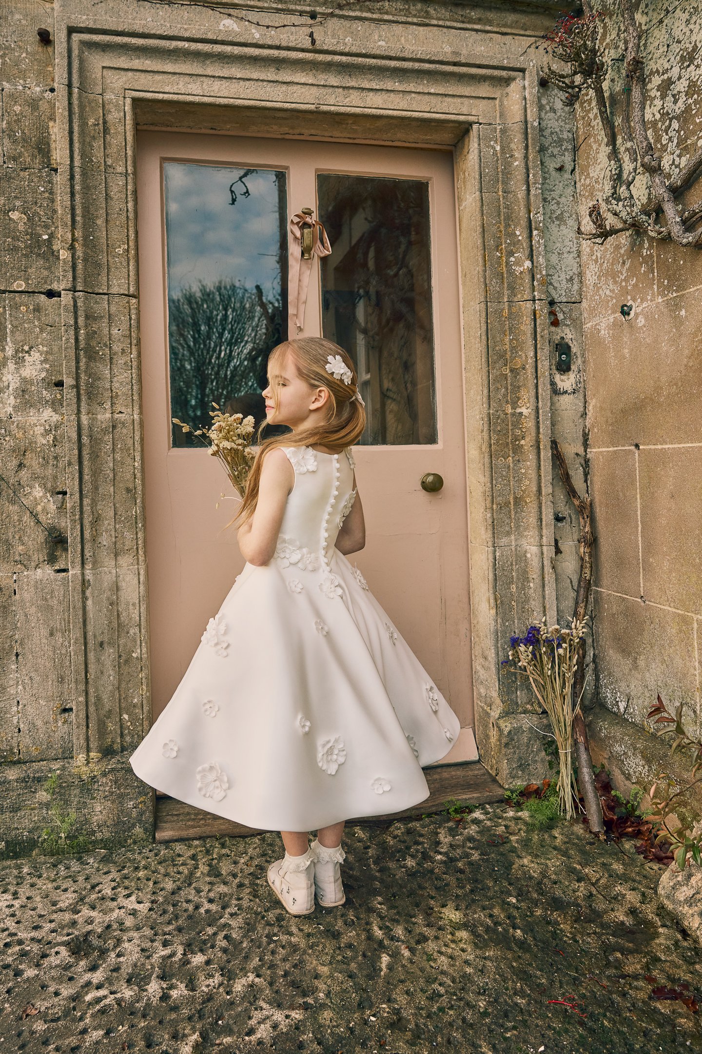 Fable by Justin Alexander Style FG012 Joni Satin Tea Length A-Line Sleeveless Dress with Floral Appliqués Scattered On Shoulder to Waist