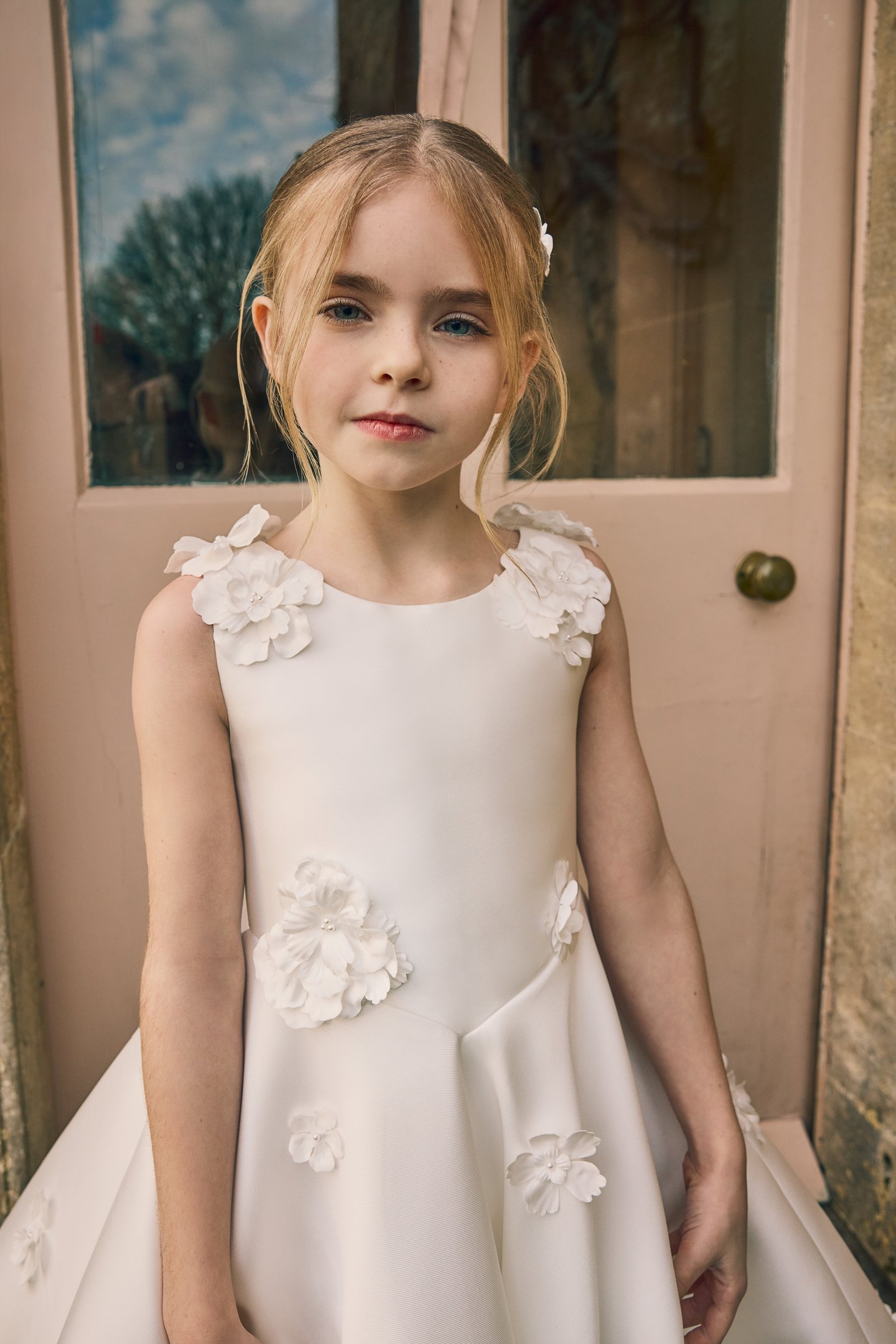 Fable by Justin Alexander Style FG012 Joni Satin Tea Length A-Line Sleeveless Dress with Floral Appliqués Scattered On Shoulder to Waist