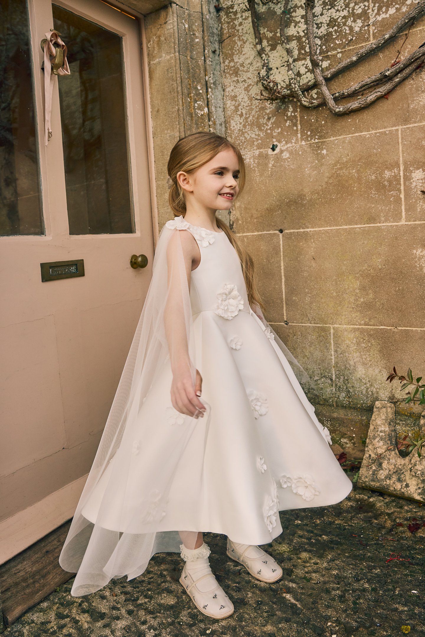 Fable by Justin Alexander Style FG012 Joni Satin Tea Length A-Line Sleeveless Dress with Floral Appliqués Scattered On Shoulder to Waist