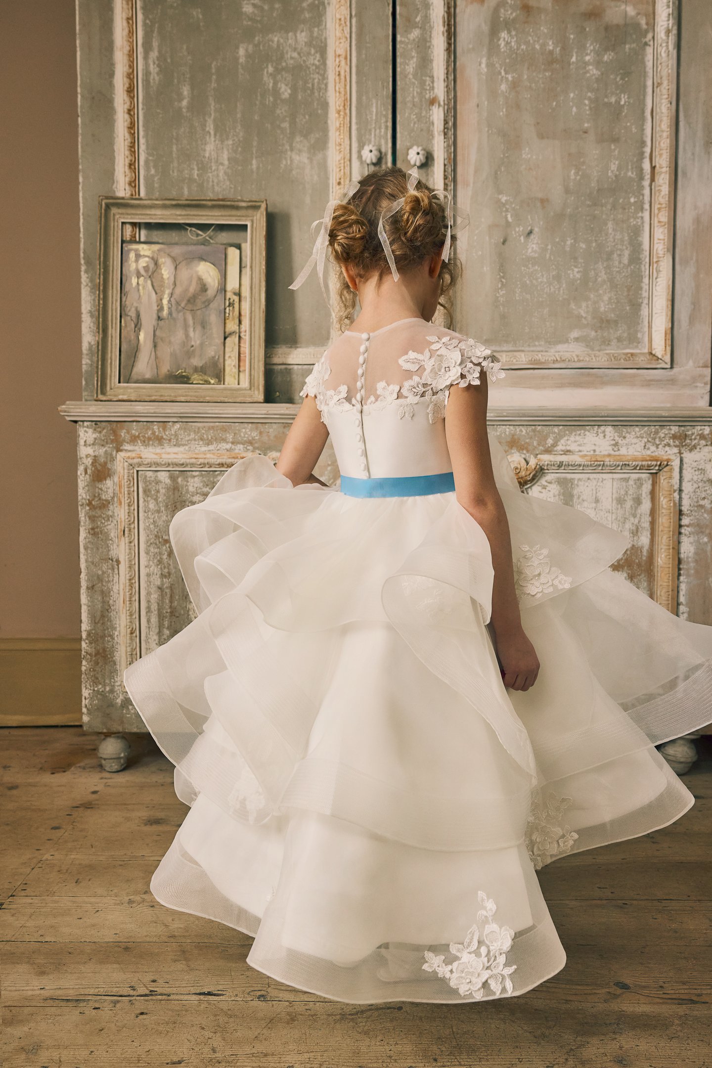 Fable by Justin Alexander Style FG015 Norah Organza Tea Length Ball Gown with Illusion Neckline, Floral Lace Appliqués, and Ruffled Layered Skirt